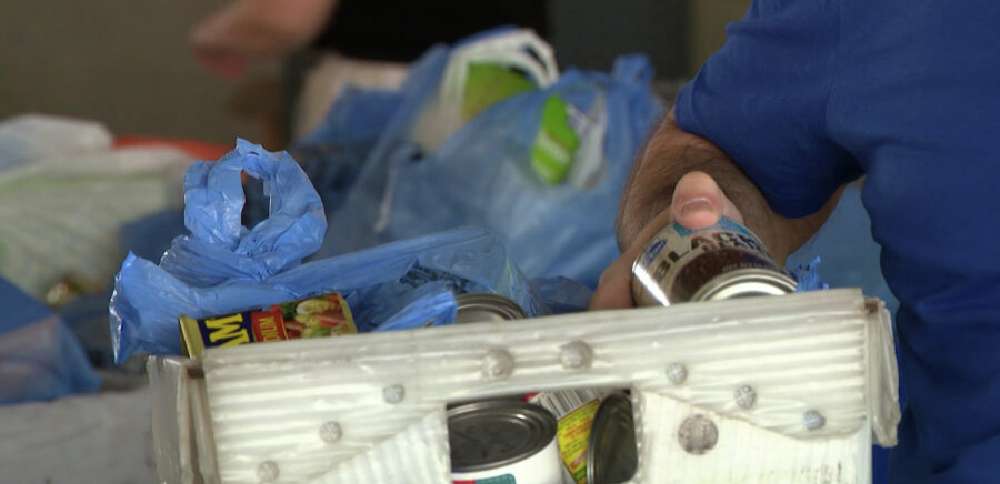 Utah postal carriers deliver donations for Stamp Out Hunger Food Drive