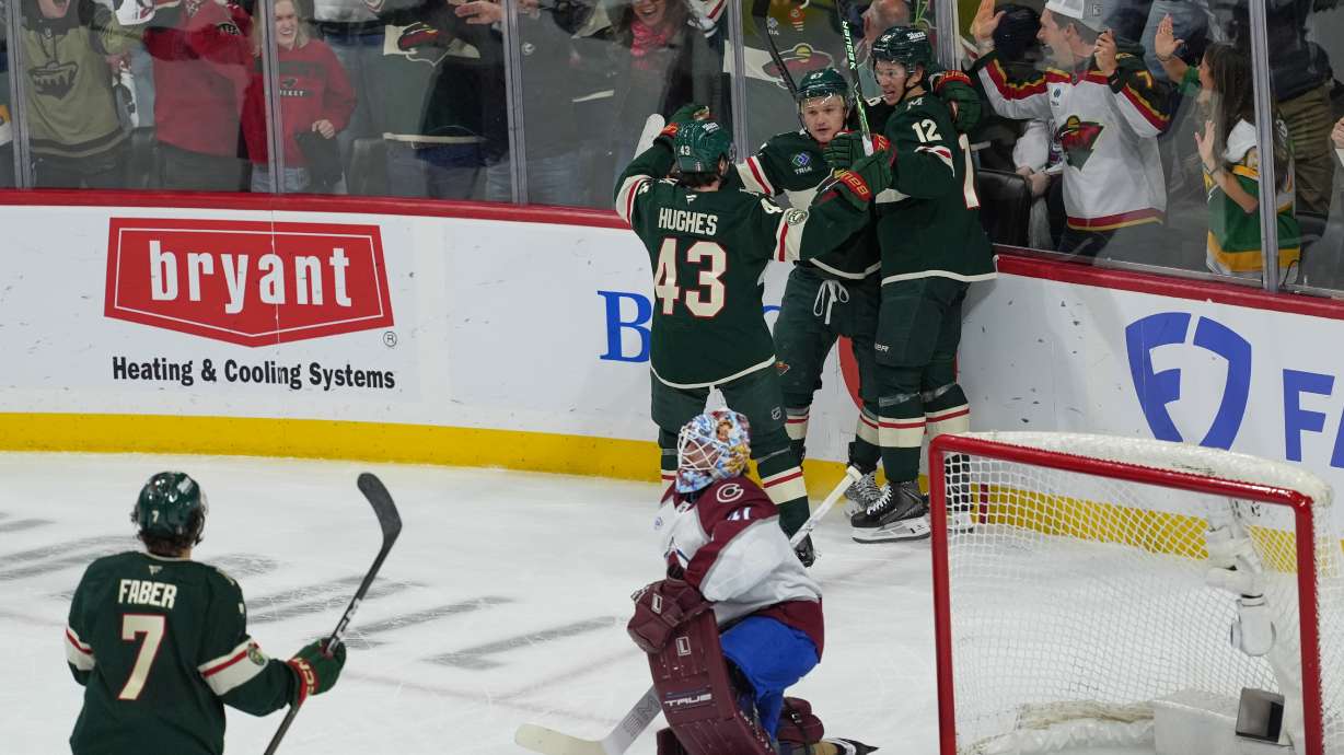 Minnesota Wild left wing Kirill Kaprizov (97) celebrates with teammates after scoring during the first period of Game 3 of an NHL Stanley Cup hockey second-round playoff series against the Colorado Avalanche, Saturday, May 9, 2026, in St. Paul, Minn.