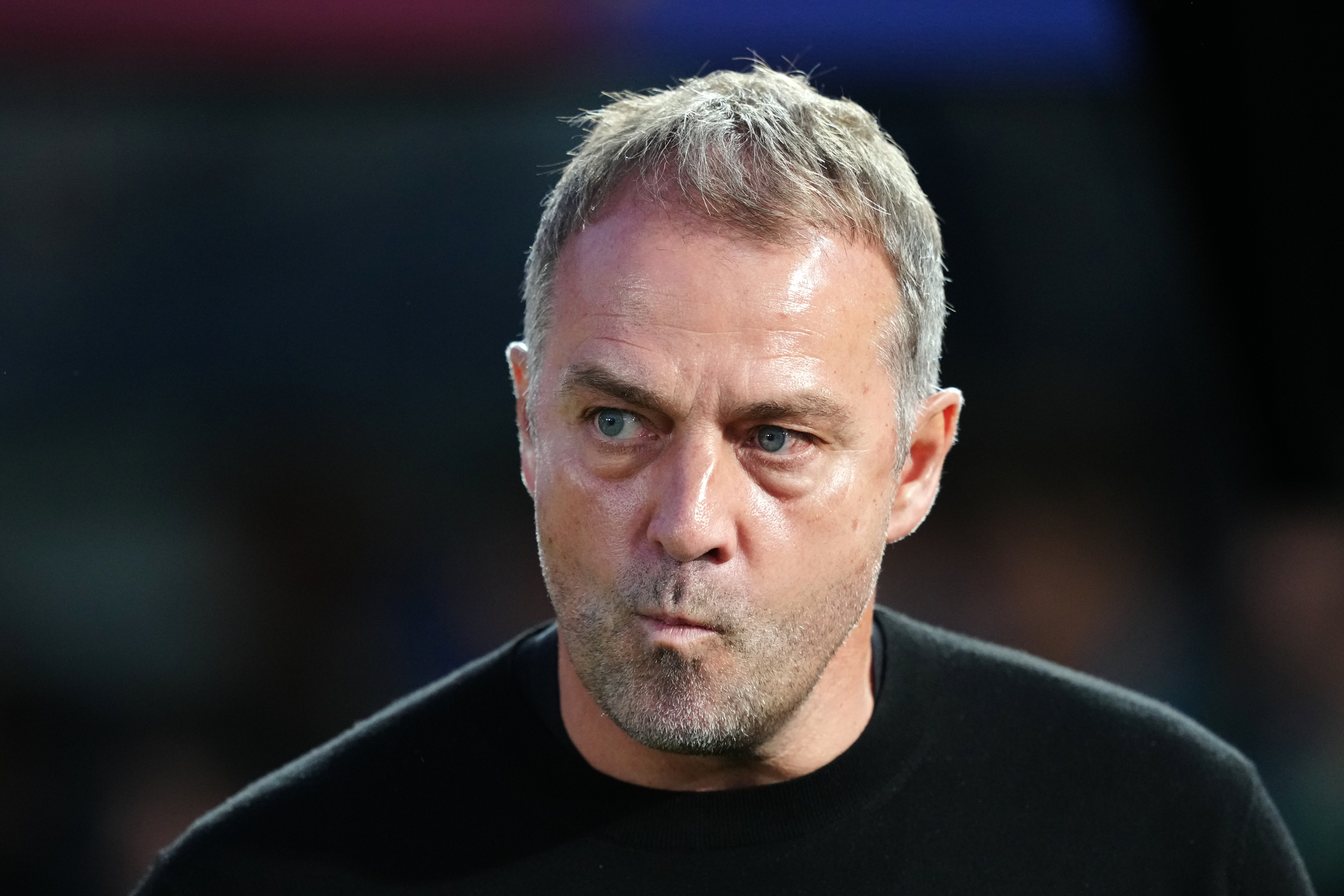 Barcelona head coach Hansi Flick stands by the touchline before the Spanish La Liga soccer match between FC Barcelona and Real Madrid in Barcelona, Spain, Sunday, May 10, 2026. 