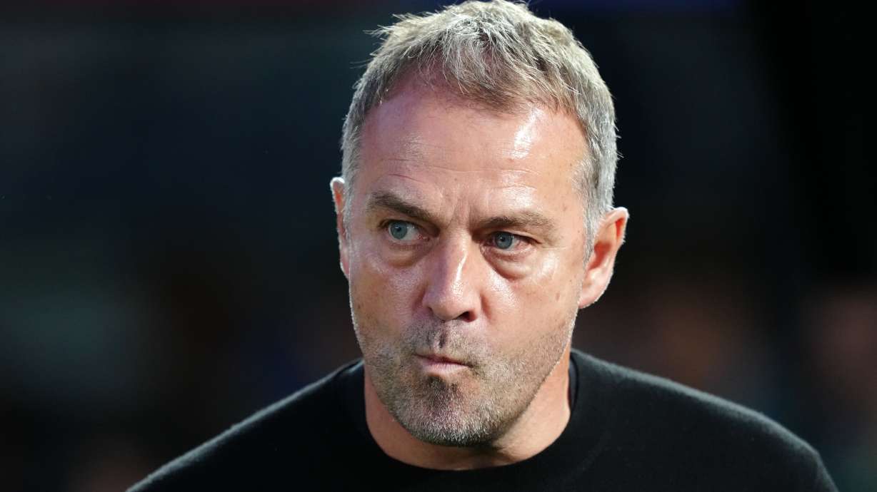 Barcelona head coach Hansi Flick stands by the touchline before the Spanish La Liga soccer match between FC Barcelona and Real Madrid in Barcelona, Spain, Sunday, May 10, 2026.