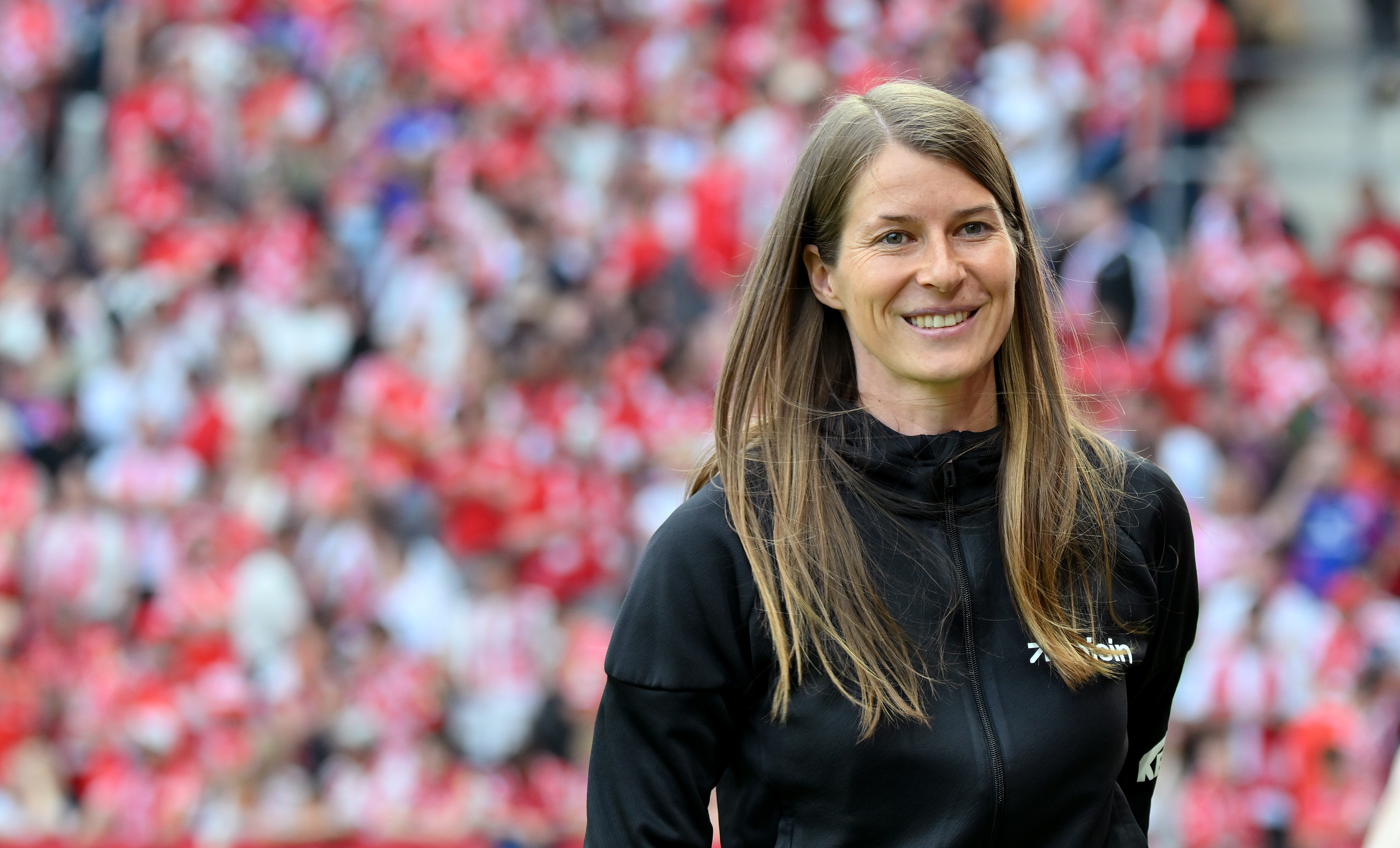 Union Berlin's coach Marie-Louise Eta smiles before the German Bundesliga soccer match between 1. FSV Mainz 05 and 1. FC Union Berlin in Mainz, Germany, Saunday, May 10, 2026. 
