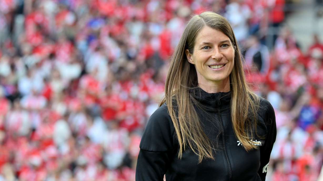 Union Berlin's coach Marie-Louise Eta smiles before the German Bundesliga soccer match between 1. FSV Mainz 05 and 1. FC Union Berlin in Mainz, Germany, Saunday, May 10, 2026.