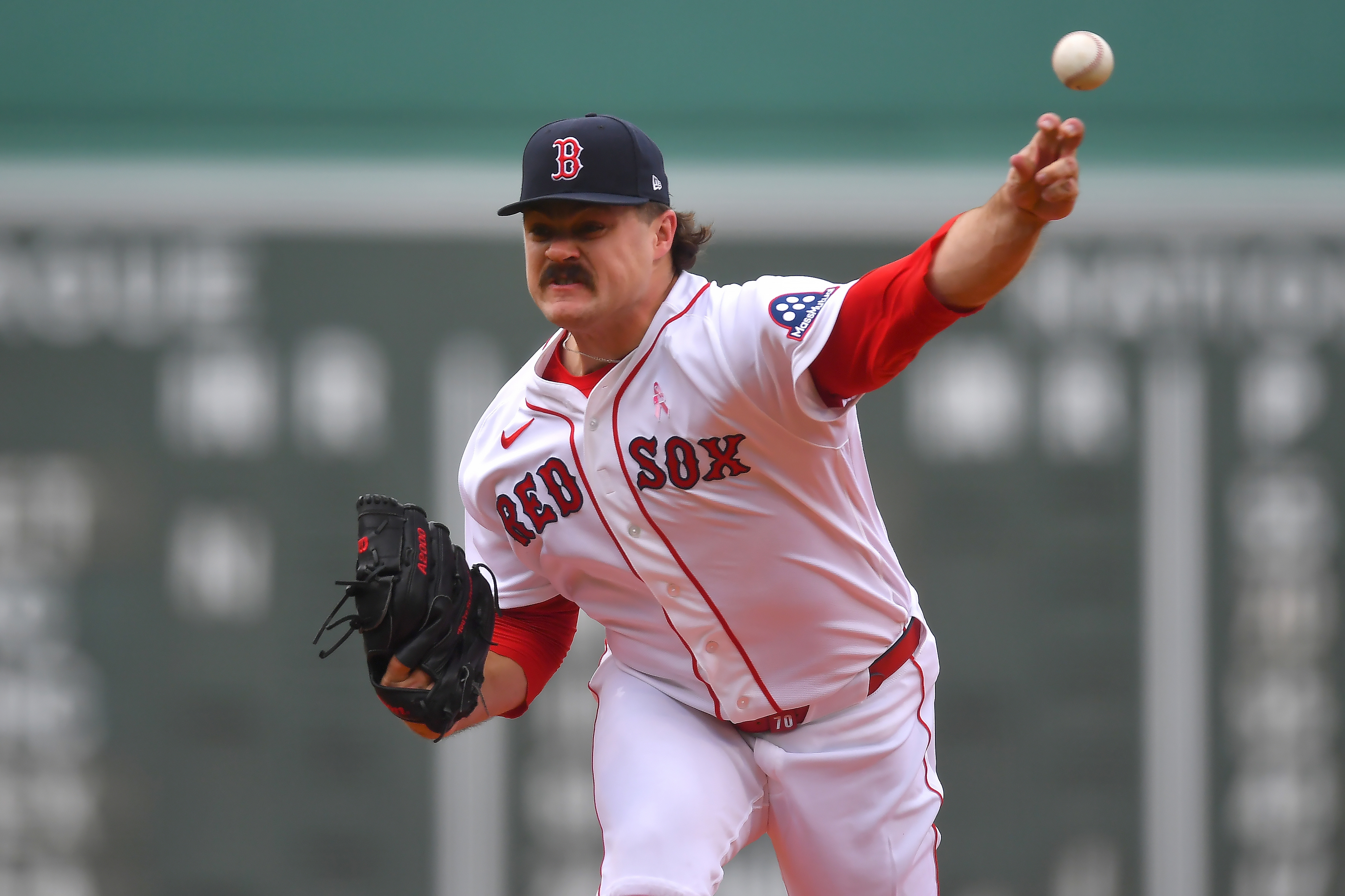 Have You Seen This? Red Sox pitcher hugs it out while tagging out runner