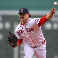 Have You Seen This? Red Sox pitcher hugs it out while tagging out runner