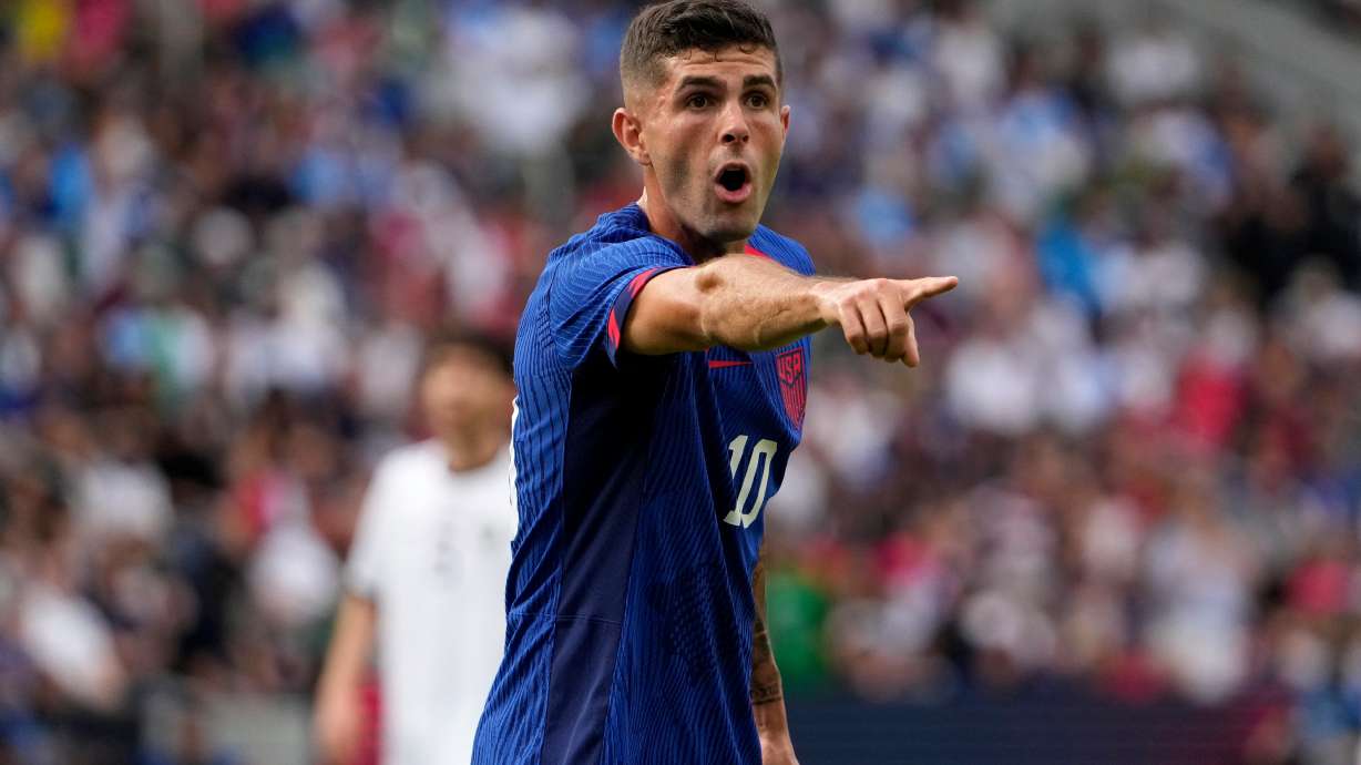 FILE - United States' Christian Pulisic points during the first half of an international friendly soccer match against Uzbekistan Saturday, Sept. 9, 2023, in St. Louis.