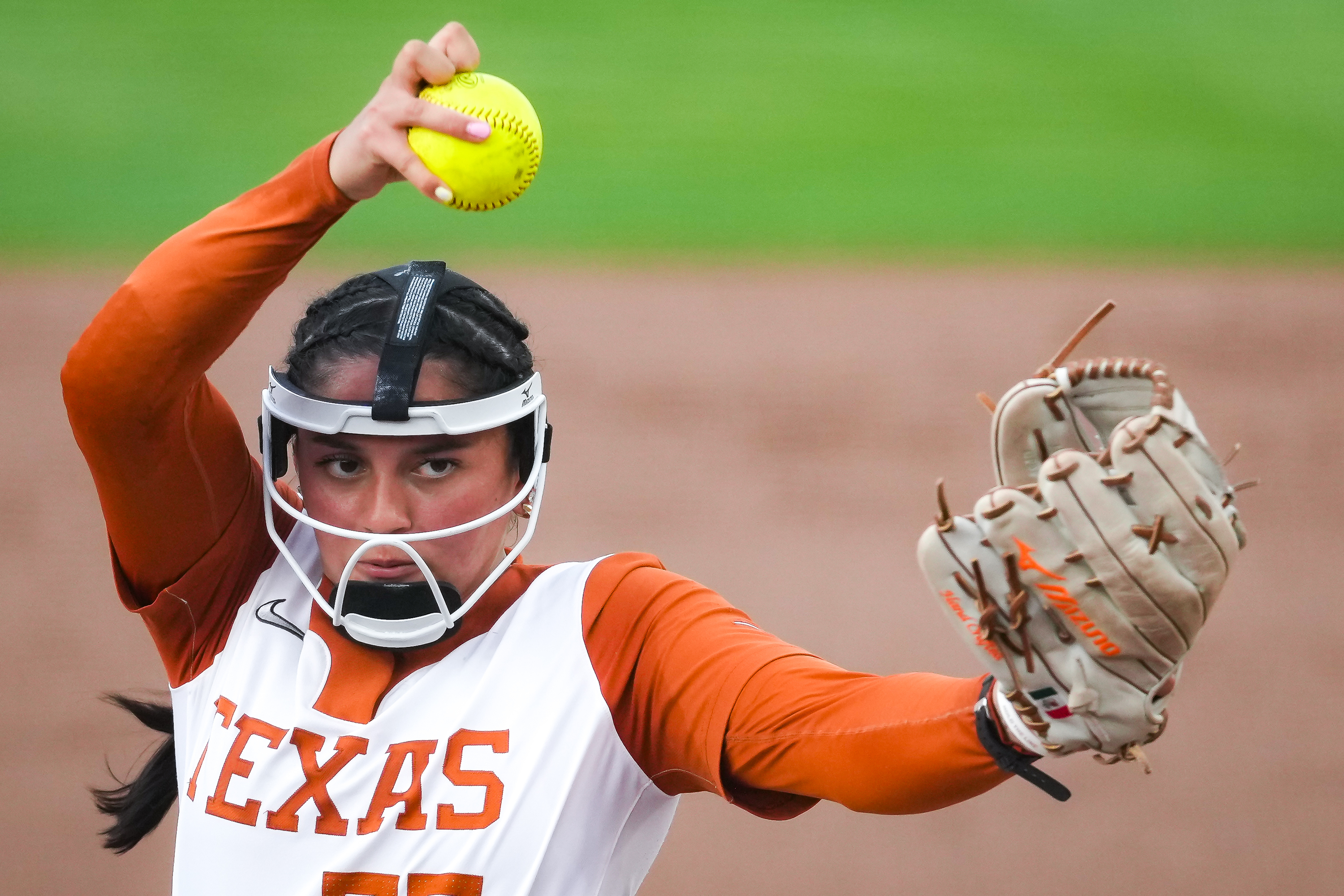 Texas Longhorns starting pitcher Citlaly Gutierrez (77) pitches in the second inning of an NCAA softball game against the Oklahoma State Cowgirls in Austin, Texas Wednesday, April 22, 2026. 