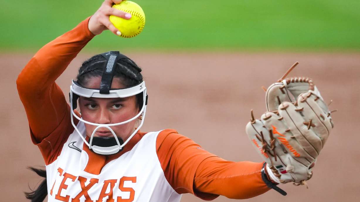 Texas Longhorns starting pitcher Citlaly Gutierrez (77) pitches in the second inning of an NCAA softball game against the Oklahoma State Cowgirls in Austin, Texas Wednesday, April 22, 2026.
