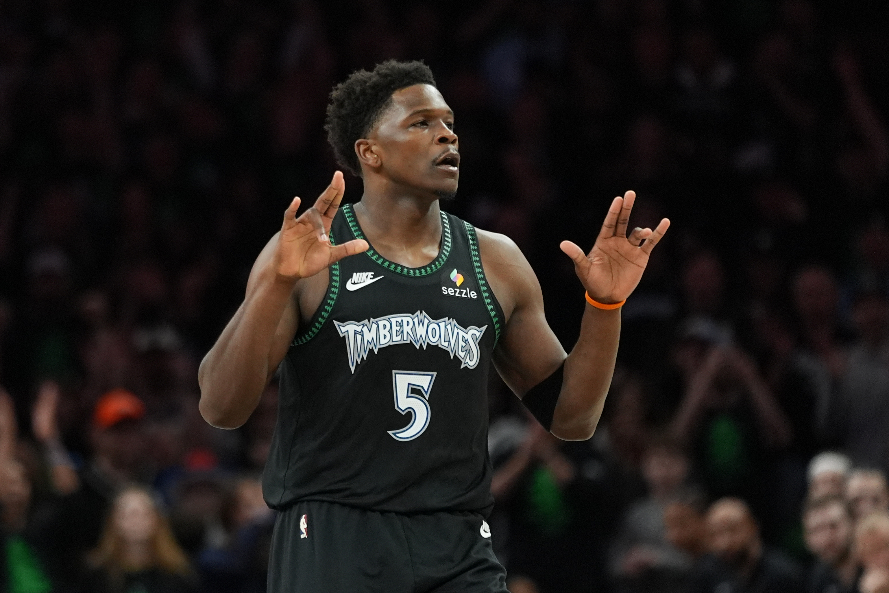 Minnesota Timberwolves guard Anthony Edwards reacts after scoring against the San Antonio Spurs during the first half of Game 4 of an NBA basketball second-round playoffs series in Minneapolis, Sunday, May 10, 2026. 