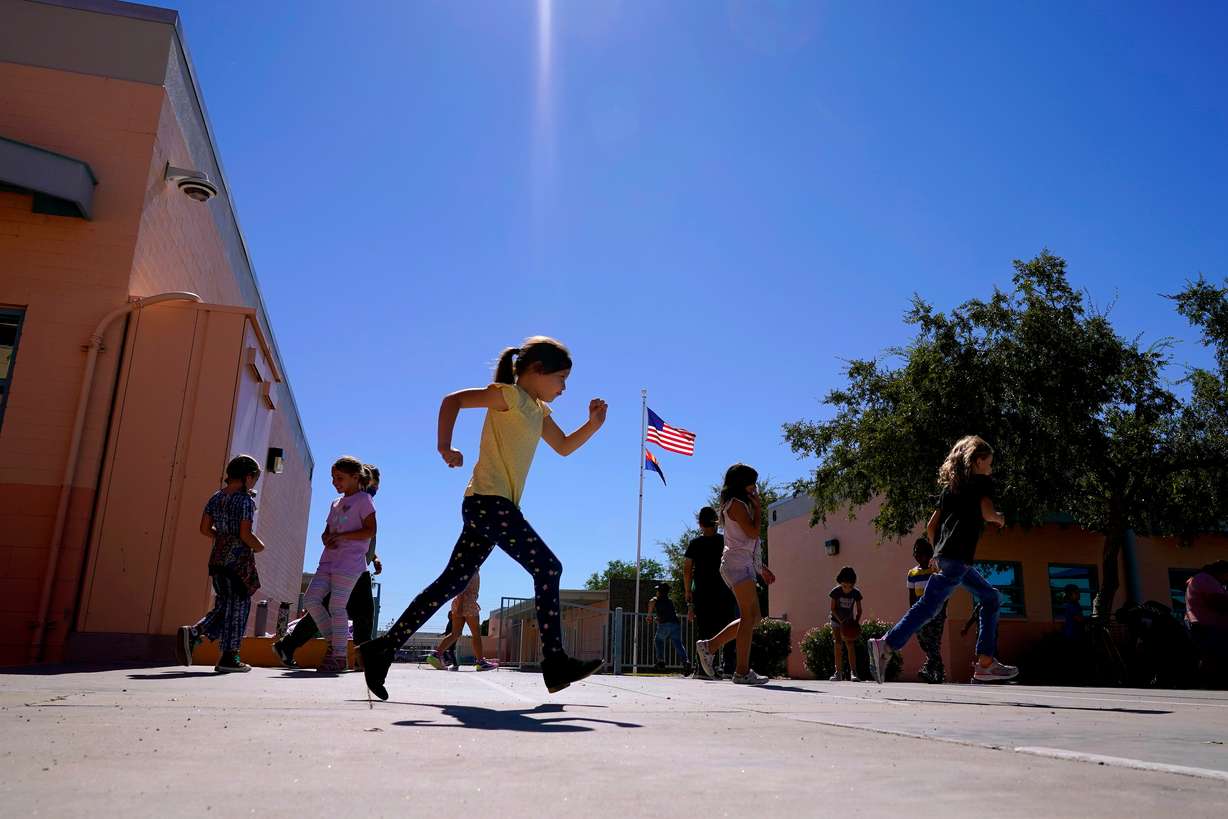 Whittier Elementary School students enjoy recess on Oct. 18, 2022, in Mesa, Ariz.