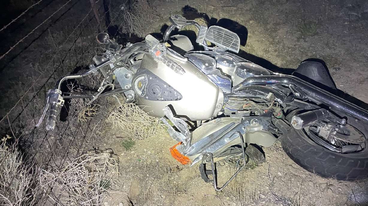 A motorcycle is pictured at the scene of a crash on U.S. 6, where the driver of the motorcycle was hit and killed while stopped on the side of the road on Sunday.
