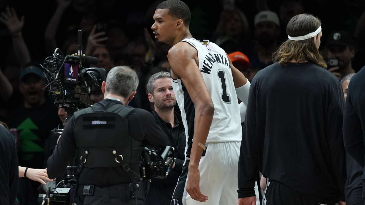 San Antonio Spurs forward Victor Wembanyama (1) reacts after he was ejected for a flagrant foul during the first half of Game 4 of an NBA basketball second-round playoffs series against the Minnesota Timberwolves in Minneapolis, Sunday, May 10, 2026.