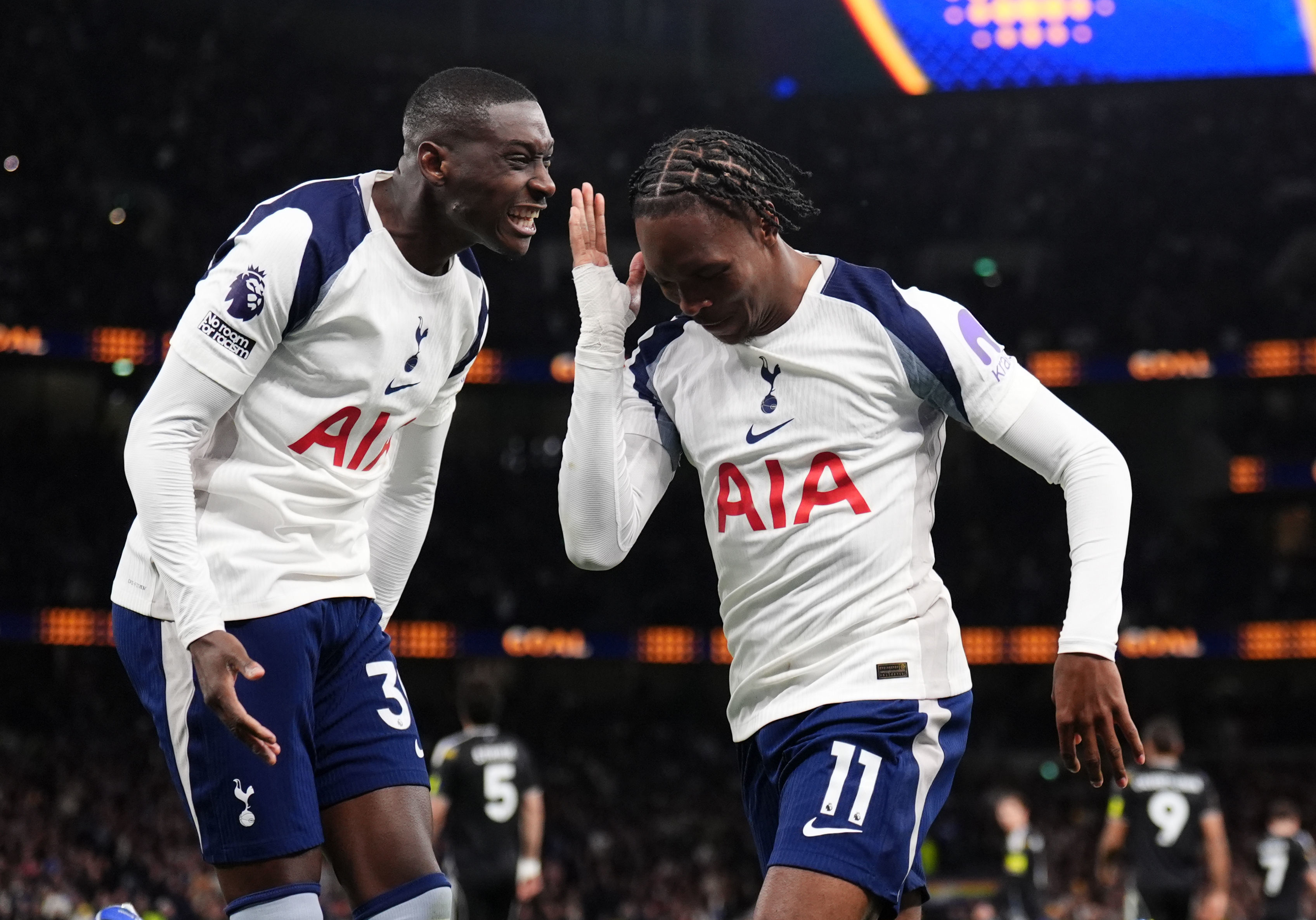 Tottenham Hotspur's Mathys Tel, right, celebrates scoring during the English Premier League soccer match between Tottenham Hotspur and Leeds United in London, Monday May 11, 2026. 