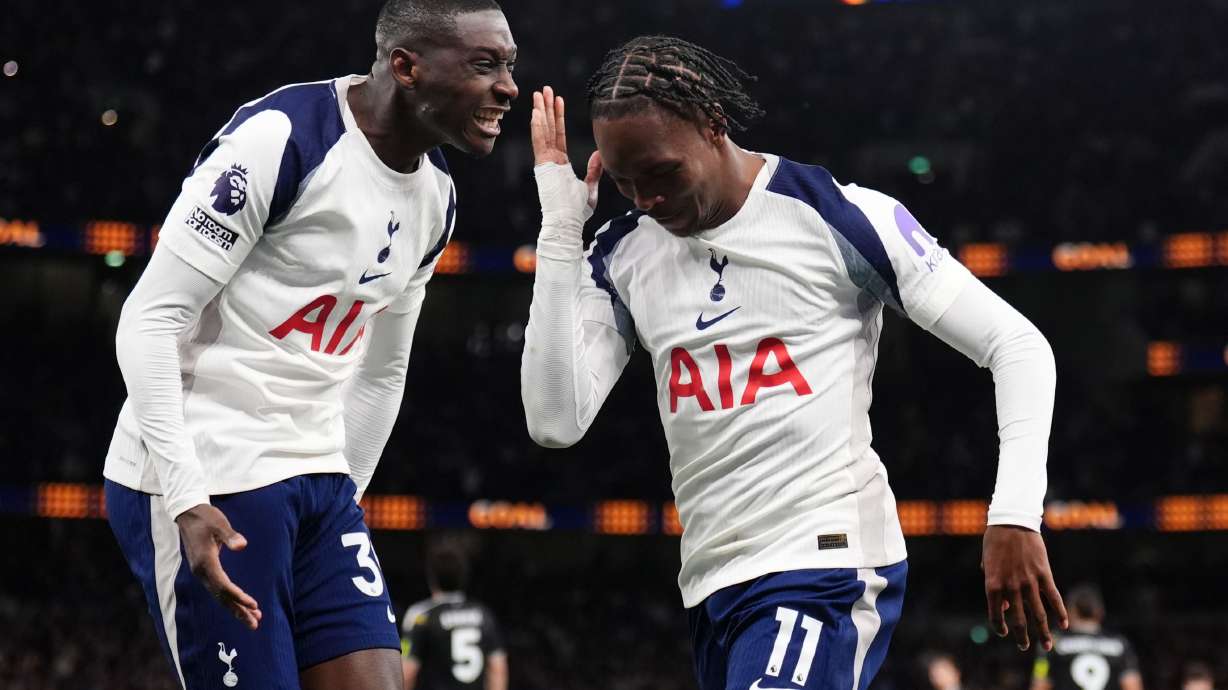 Tottenham Hotspur's Mathys Tel, right, celebrates scoring during the English Premier League soccer match between Tottenham Hotspur and Leeds United in London, Monday May 11, 2026.