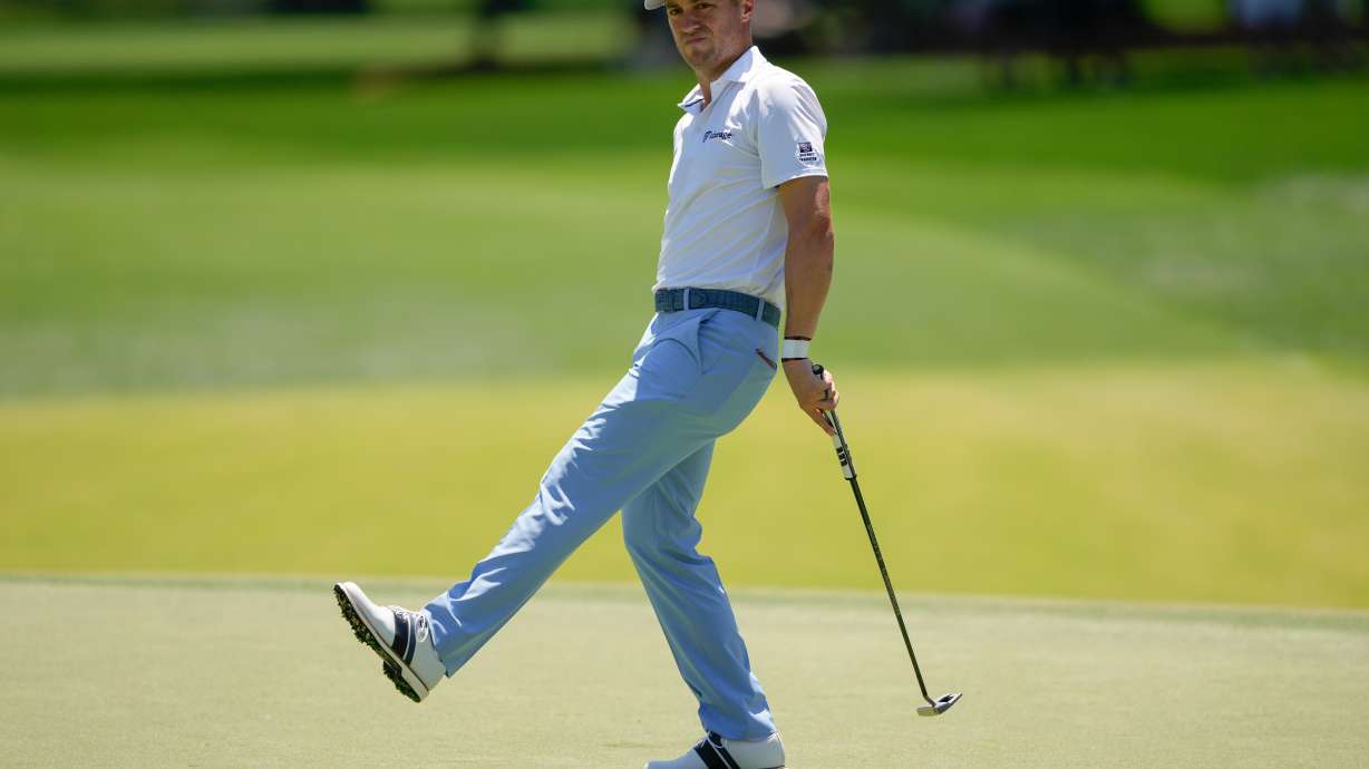 Justin Thomas reacts after missing a putt for birdie on the second hole during the final round of the Truist Championship golf tournament at the Quail Hollow Club, Sunday, May 10, 2026, in Charlotte, N.C.