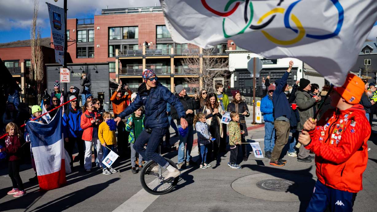 Olympians and Paralympians from across Utah, including athletes returning from the 2026 Winter Games, walk down Main Street during a Youth Sports Alliance Olympic and Paralympic Homecoming Parade in Park City on April 3.