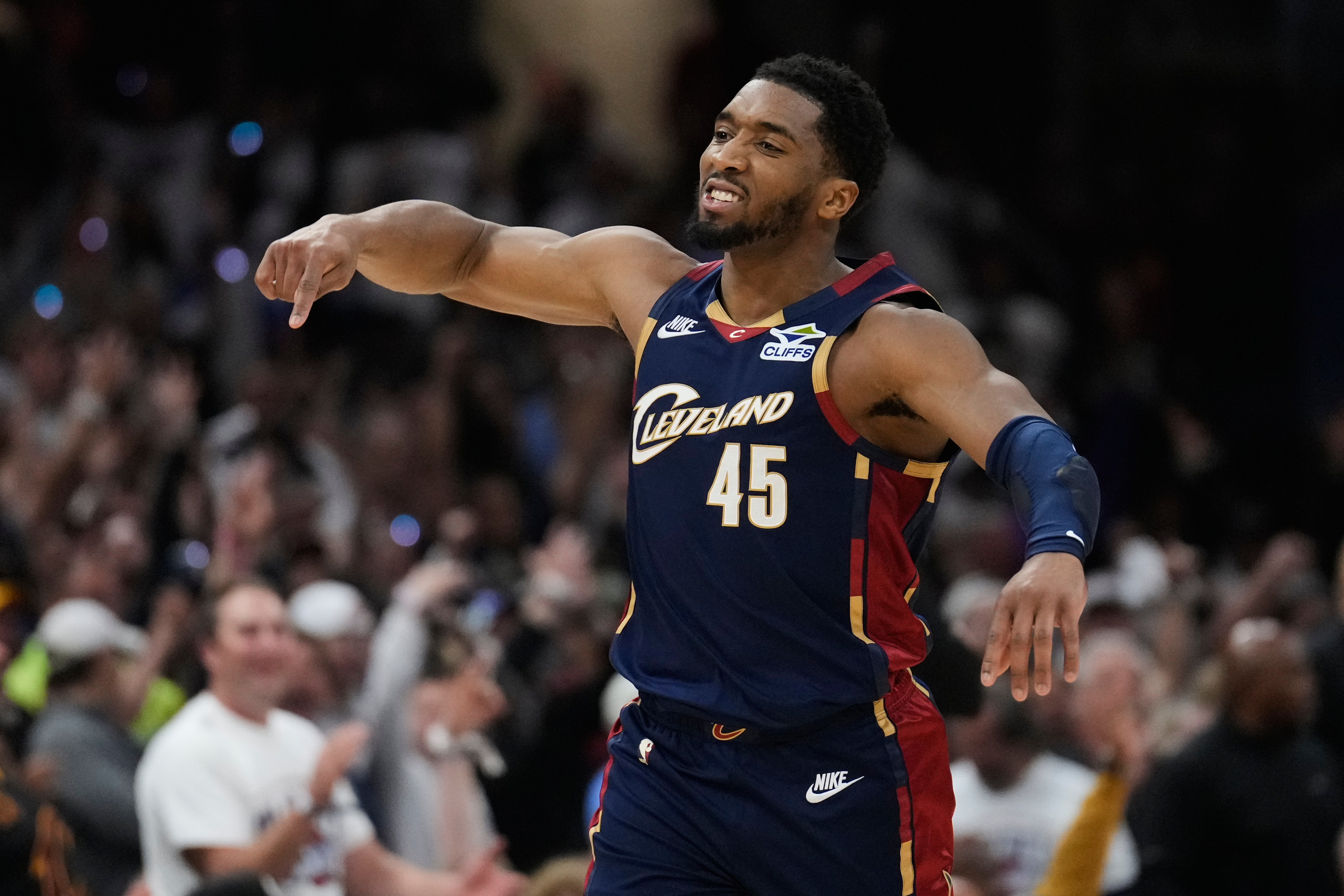 Cleveland Cavaliers' Donovan Mitchell (45) gestures after hitting a three-point basket inthe second half of Game 4 of a second-round NBA basketball playoff series against the Detroit Pistons Monday, May 11, 2026, in Cleveland. 