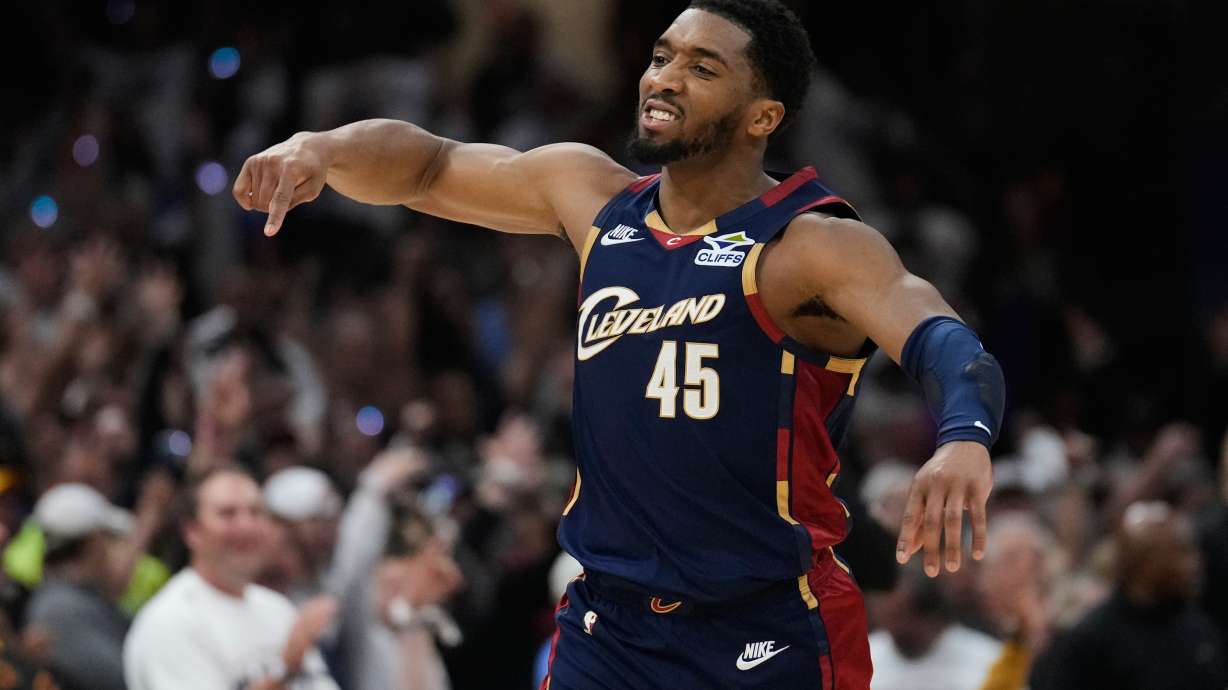 Cleveland Cavaliers' Donovan Mitchell (45) gestures after hitting a three-point basket inthe second half of Game 4 of a second-round NBA basketball playoff series against the Detroit Pistons Monday, May 11, 2026, in Cleveland.