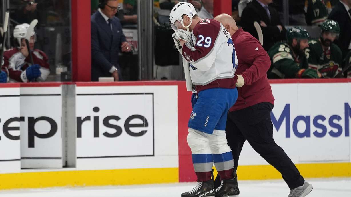 Colorado Avalanche center Nathan MacKinnon (29) leaves the ice during the second period of Game 4 in an NHL Stanley Cup hockey second-round playoff series against the Minnesota Wild Monday, May 11, 2026, in St. Paul, Minn.