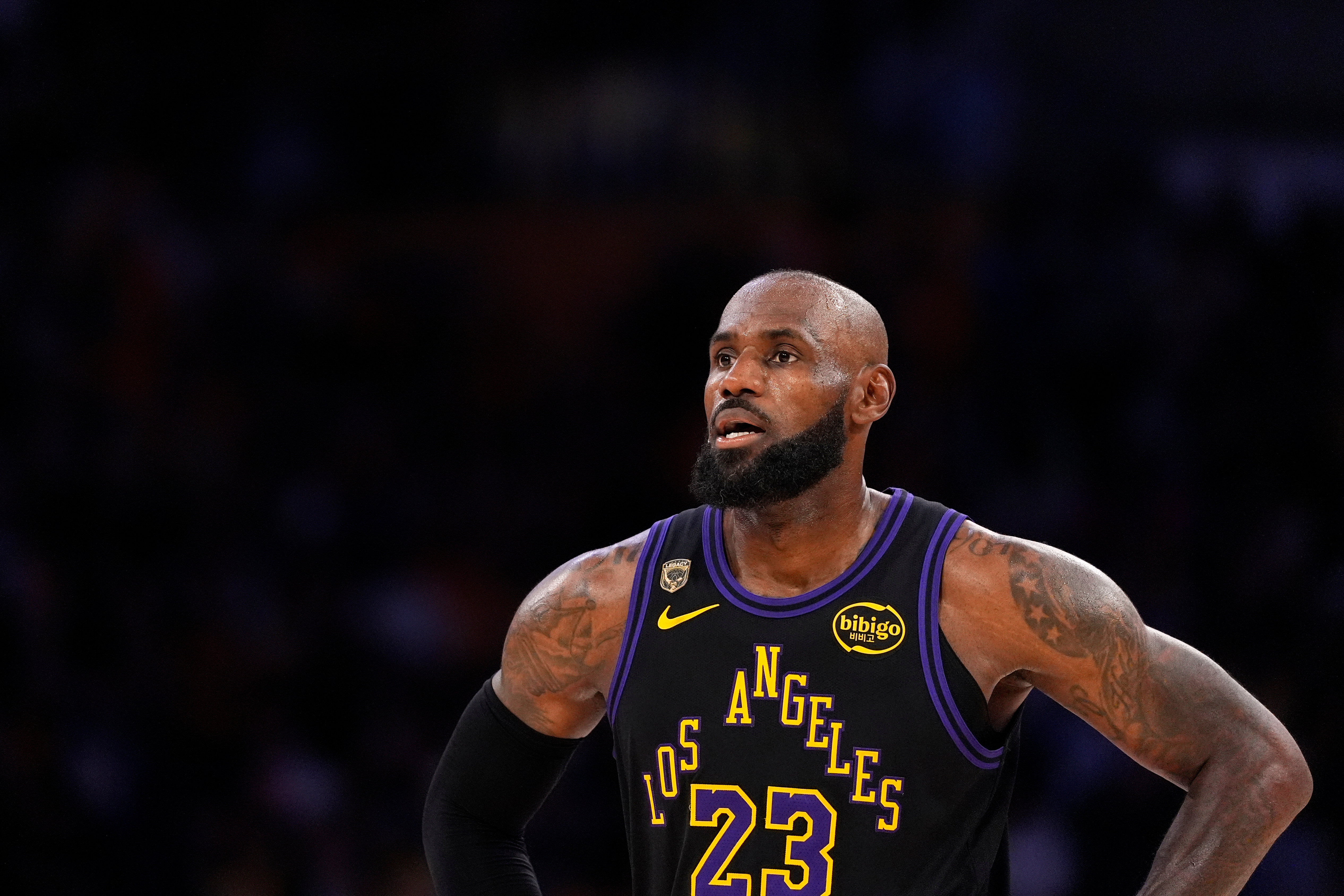 Los Angeles Lakers forward LeBron James stands on the court in the closing minutes of Game 4 in a second-round NBA basketball playoffs series against the Oklahoma City Thunder, Monday, May 11, 2026, in Los Angeles. 
