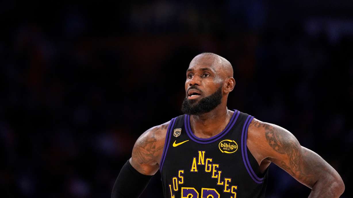 Los Angeles Lakers forward LeBron James stands on the court in the closing minutes of Game 4 in a second-round NBA basketball playoffs series against the Oklahoma City Thunder, Monday, May 11, 2026, in Los Angeles.