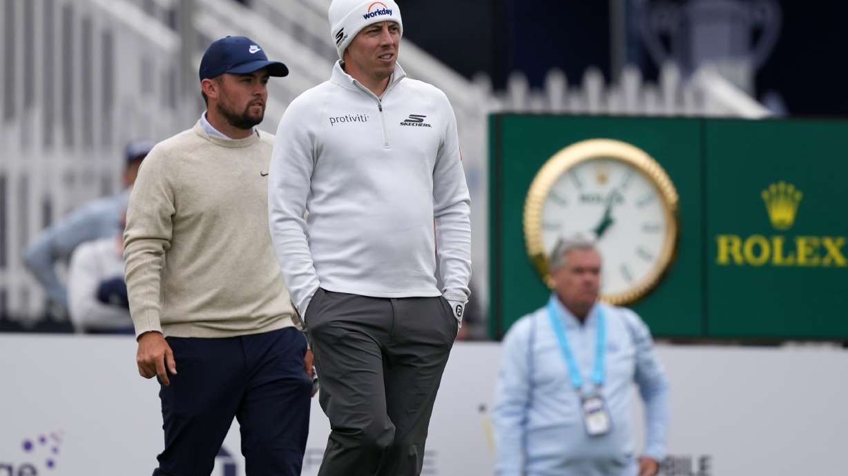 Matt Fitzpatrick, right, and Alex Fitzpatrick walk down the ninth hole during practice before the PGA Championship golf tournament at the Aronimink Golf Club Monday, May 11, 2026, in Newtown Square, Pa.