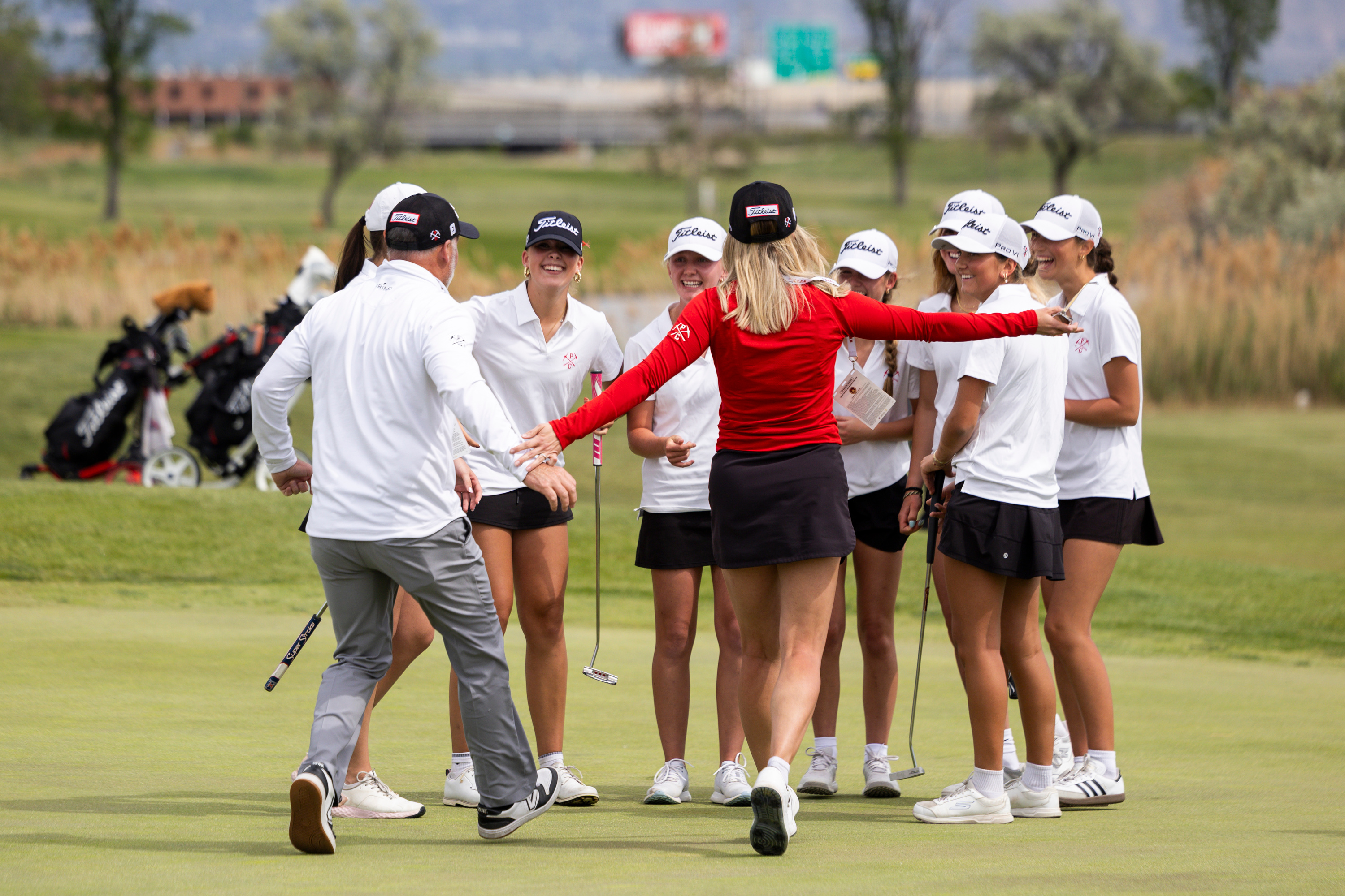 Members of the Park City girls golf team celebrate after winning a playoff against Juan Diego to win the team title at the 4A girls golf state championship at Glendale Golf Course in Salt Lake City on Thursday, May 7, 2026.