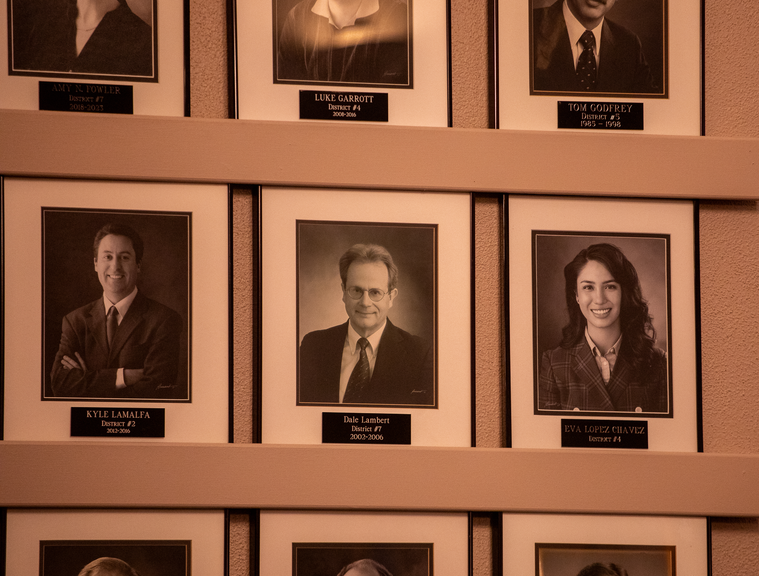 Former Salt Lake City Councilwoman Eva Lopez Chavez's portait is seen along with other former members within the Salt Lake City Council's work session chambers Tuesday afternoon. Her seat was vacated earlier in the day.
