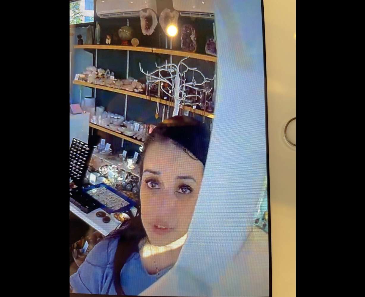 A woman is seen in surveillance video at Rising Moon Minerals in Riverton on Friday. She is believed to have stolen hundreds of dollars' worth of merchandise after spending nearly 45 minutes at the store.