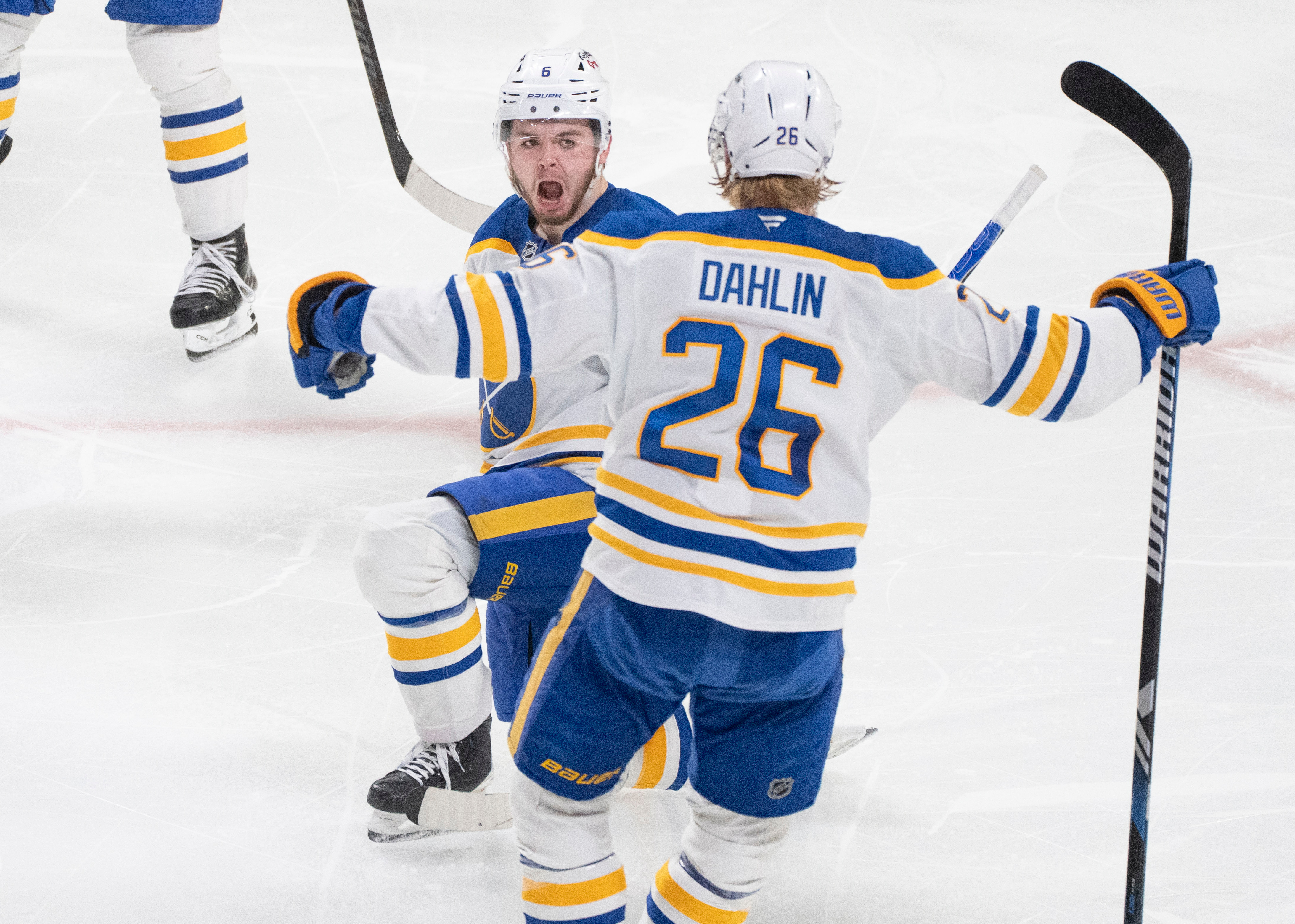 Buffalo Sabres' Zach Benson (6) celebrates his goal over Montreal Canadiens with teammate Rasmus Dahlin (26) during third period, second round, game 4, NHL playoff action in Montreal on Tuesday, May 12, 2026. 