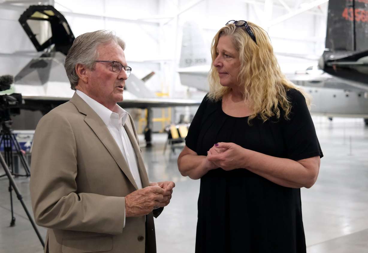 Sen. Jerry Stevenson, R-Layton, talks with Mary Anne Carter, National Endowment for the Arts chairman, at an event to announce the Blue Star Museum program, which offers free museum access to active military personnel and their families, at the Hill Aerospace Museum at Hill Air Force Base on Tuesday. The program runs May 16-Sept. 7.