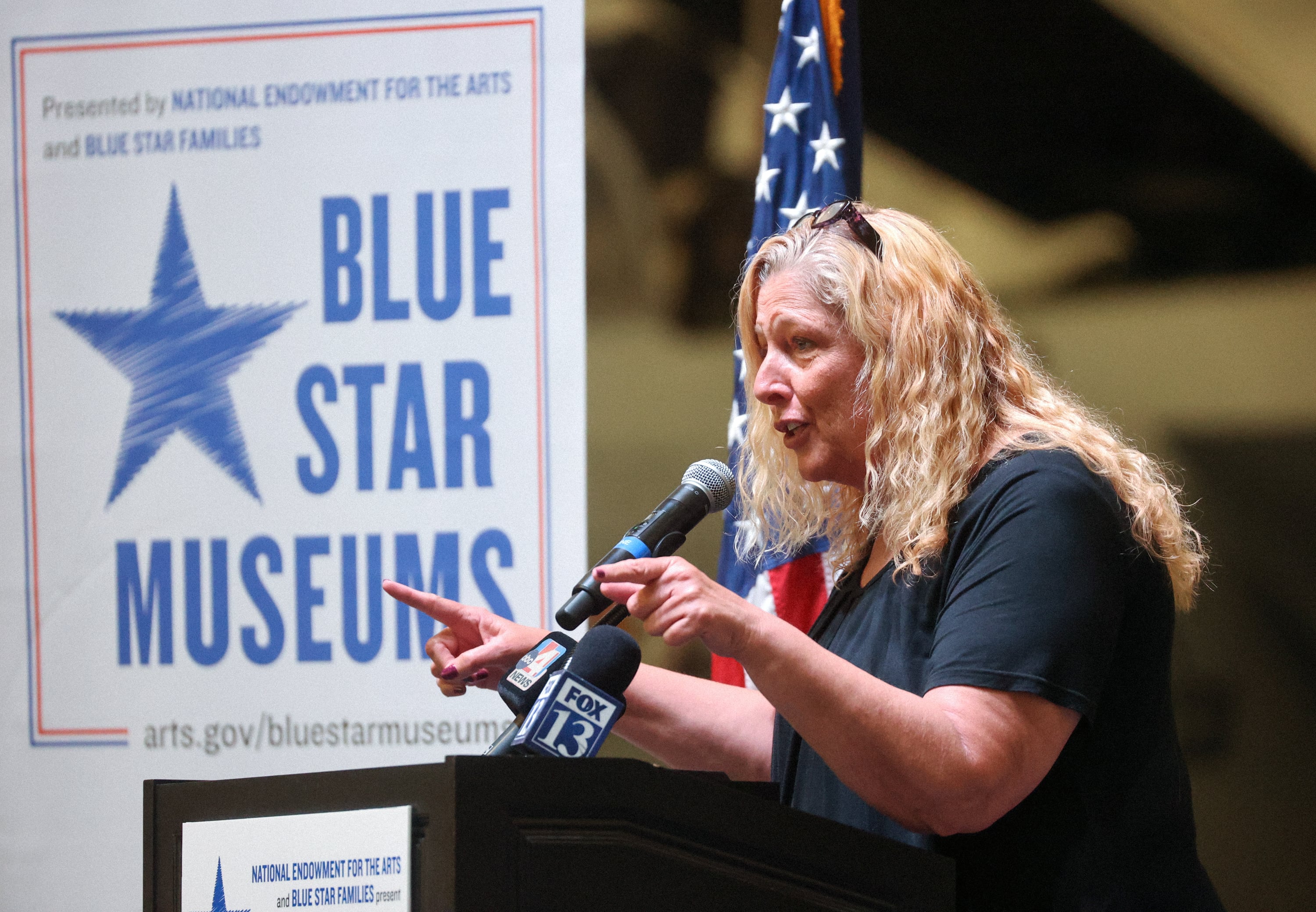 Mary Anne Carter, National Endowment for the Arts chairman, speaks at an event to announce the Blue Star Museum program, which offers free museum access to active military personnel and their families, at the Hill Aerospace Museum at Hill Air Force Base on Tuesday. The program runs May 16-Sept. 7.