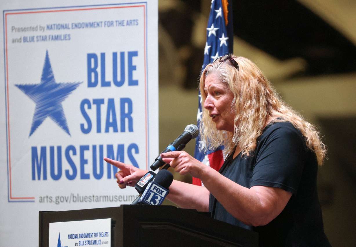 Mary Anne Carter, National Endowment for the Arts chairman, speaks at an event to announce the Blue Star Museum program, which offers free museum access to active military personnel and their families, at the Hill Aerospace Museum at Hill Air Force Base on Tuesday. The program runs May 16-Sept. 7.