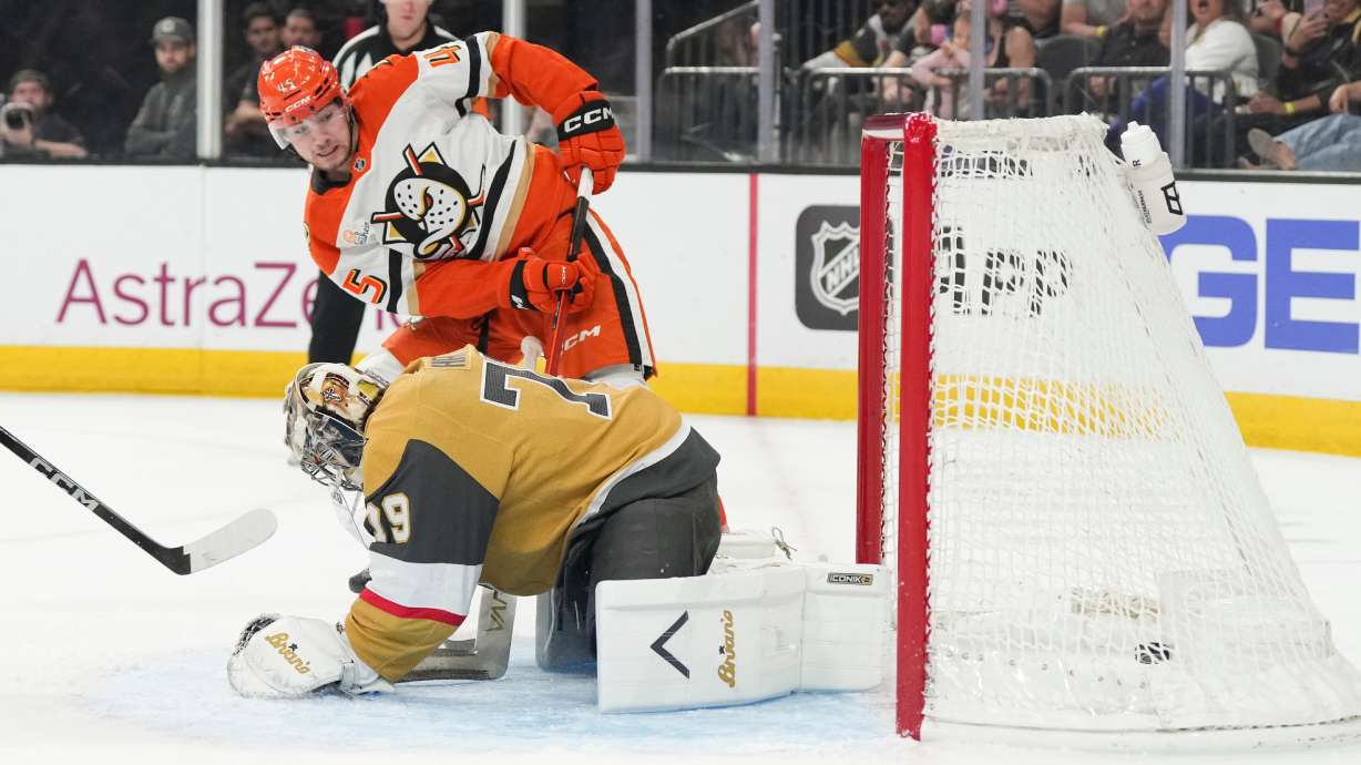 Anaheim Ducks right wing Beckett Sennecke (45) scores against Vegas Golden Knights goaltender Carter Hart (79) during the first period of Game 5 of a second-round NHL hockey Stanley Cup playoff series Tuesday, May 12, 2026, in Las Vegas.