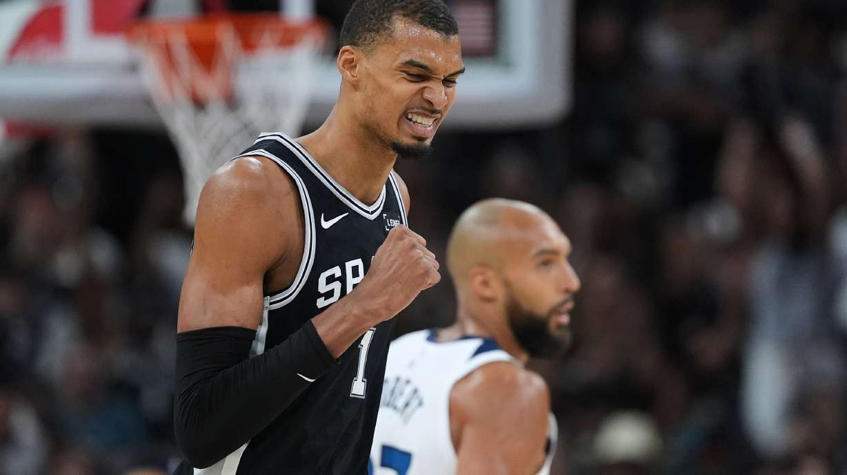 San Antonio Spurs forward Victor Wembanyama (1) reacts to a play against the Minnesota Timberwolves during the second half of Game 5 of an NBA basketball second-round playoffs series in Minneapolis, Tuesday, May 12, 2026.