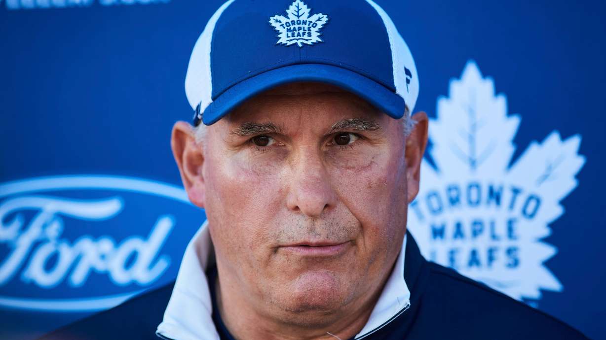 FILE - Toronto Maple Leafs head coach Craig Berube speaks to media during NHL hockey training camp in Toronto, Sept. 18, 2025.
