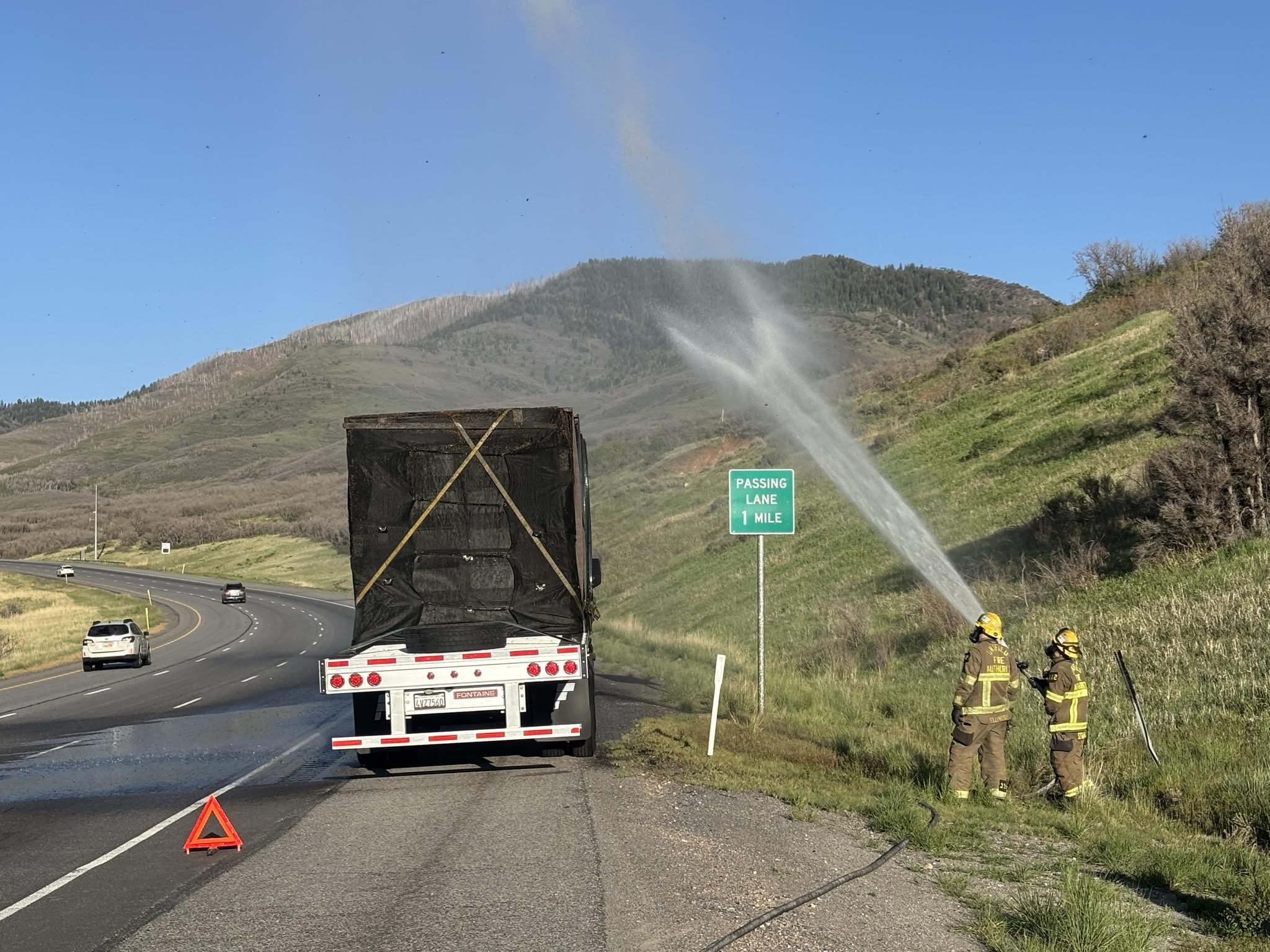 Beehive State firefighters still buzzing after semi with 25M bees breaks down