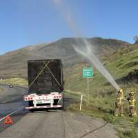 Beehive State firefighters still buzzing after semi with 25M bees breaks down