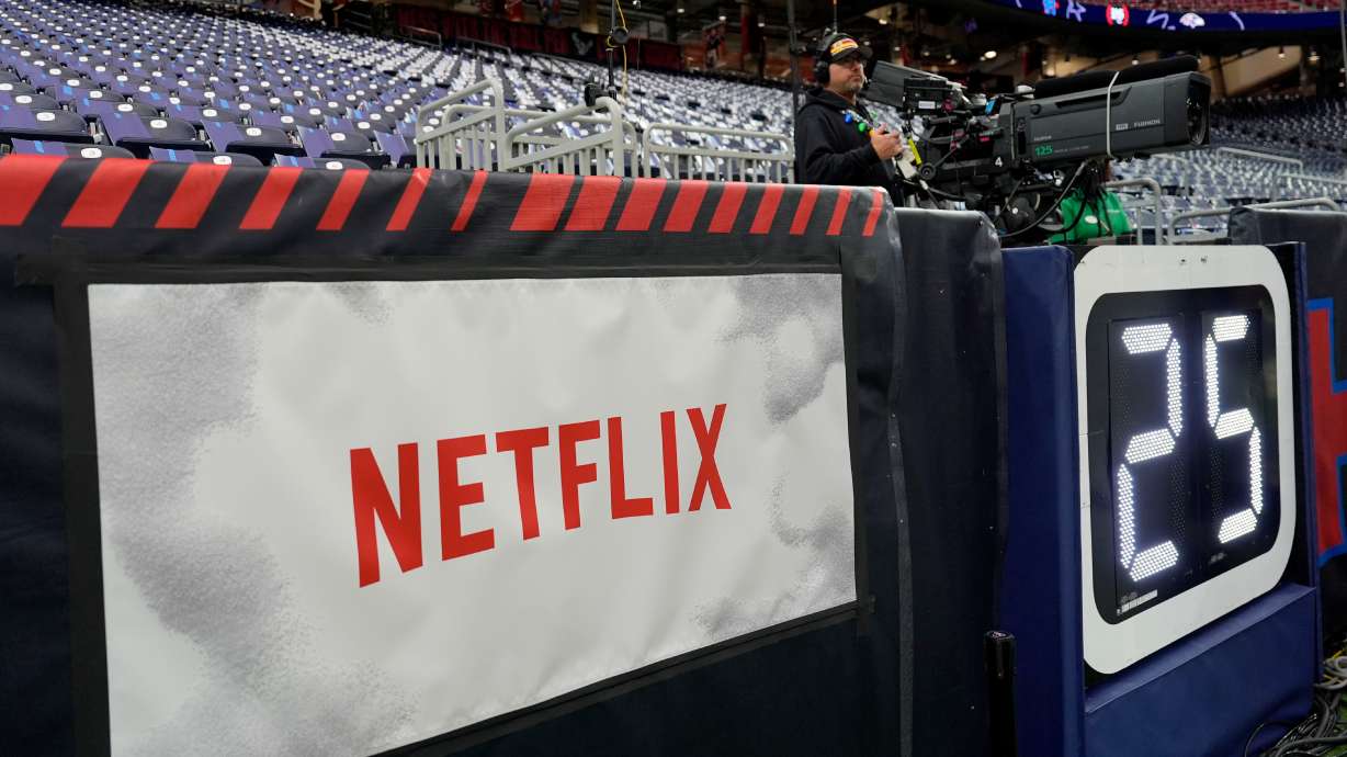 FILE - A Netflix banner is seen before an NFL football game between the Houston Texans and the Baltimore Ravens, Dec. 25, 2024, in Houston.