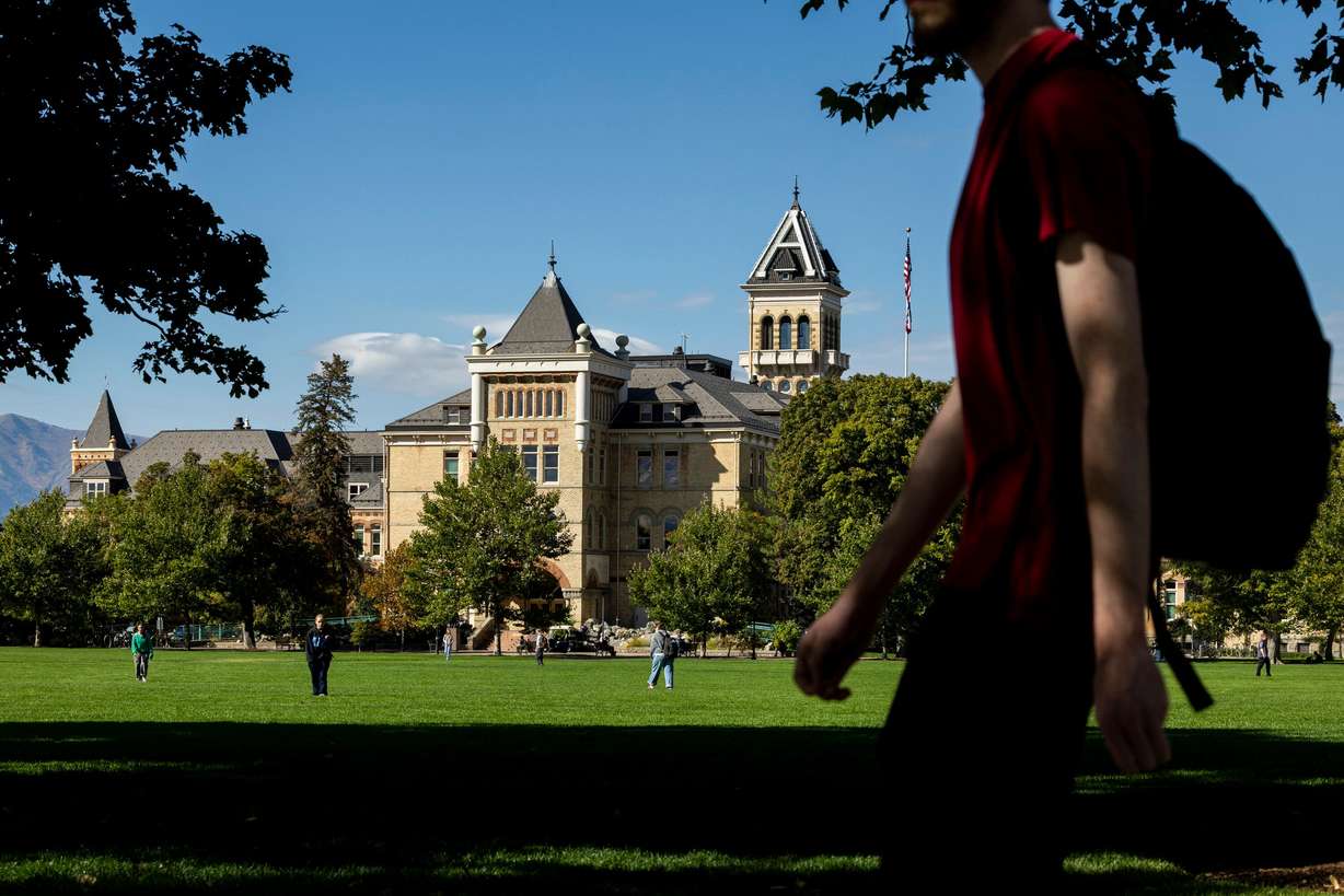 Students walk near the Old Main building on the campus of Utah State University in Logan on Oct. 1. After the recent attack on Canvas, cybersecurity experts are skeptical that the incident is over.