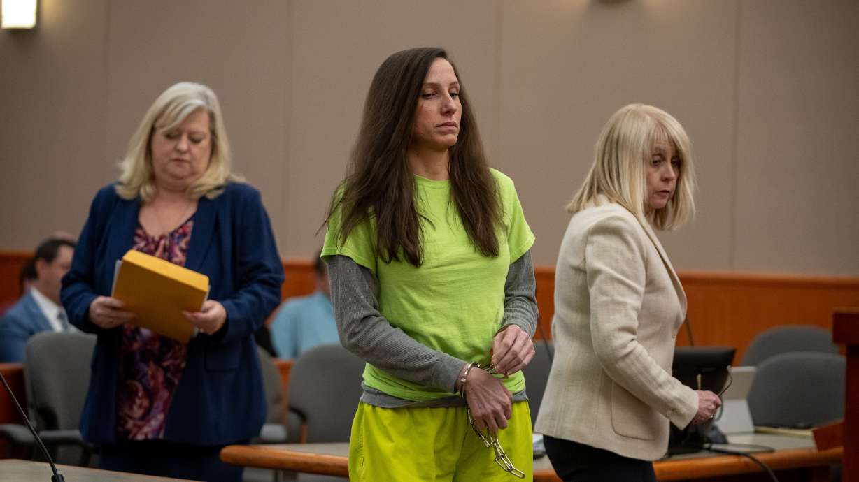 Kouri Richins prepares to speak at her sentencing in 3rd District Court in Park City on May 13. On Tuesday, a judge signed an order for her to pay money to her late husband Eric Richins' estate after she was convicted of killing him.