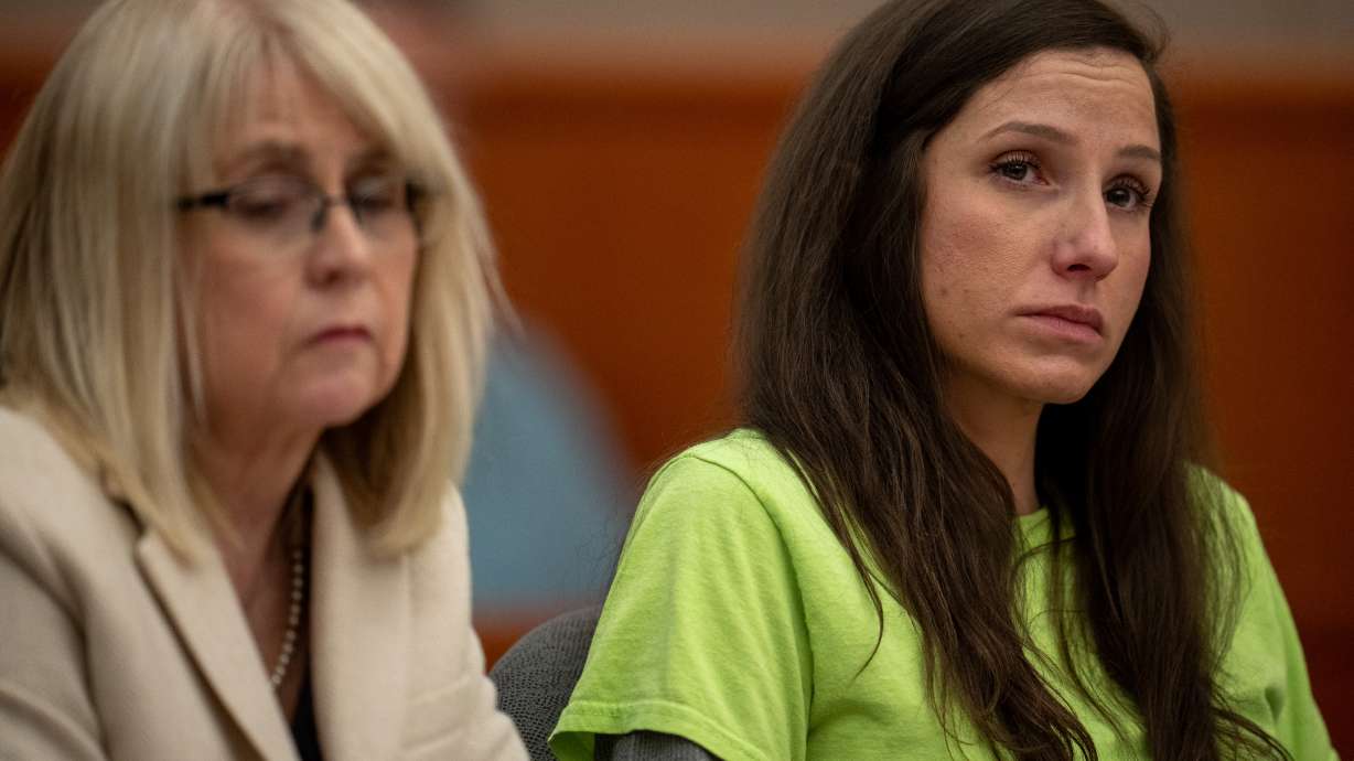 Kouri Richins listens as her attorney reads letters in her support during her sentencing in 3rd District Court in Park City on Wednesday, May 13. Richins' case involving mortgage fraud will resume in October.