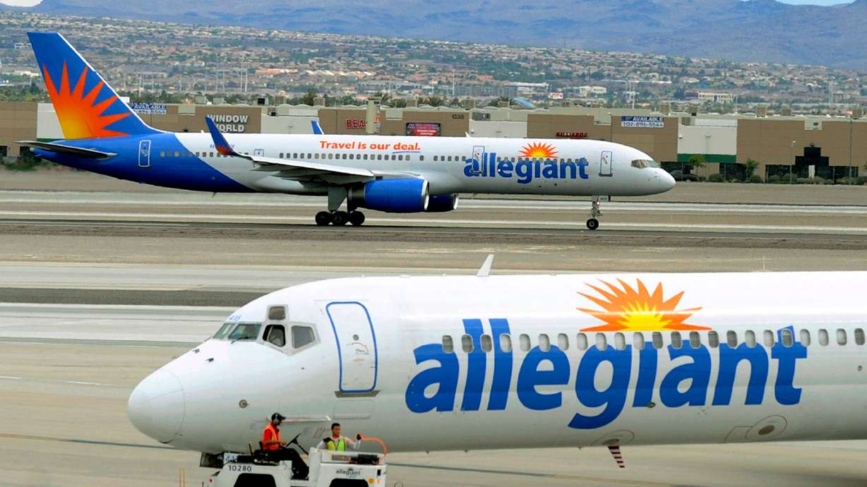 Two Allegiant Air jets taxi at then-McCarran International Airport in Las Vegas, May 9, 2013. Allegiant announced on Wednesday it had completed a purchase of Sun Country Airlines.