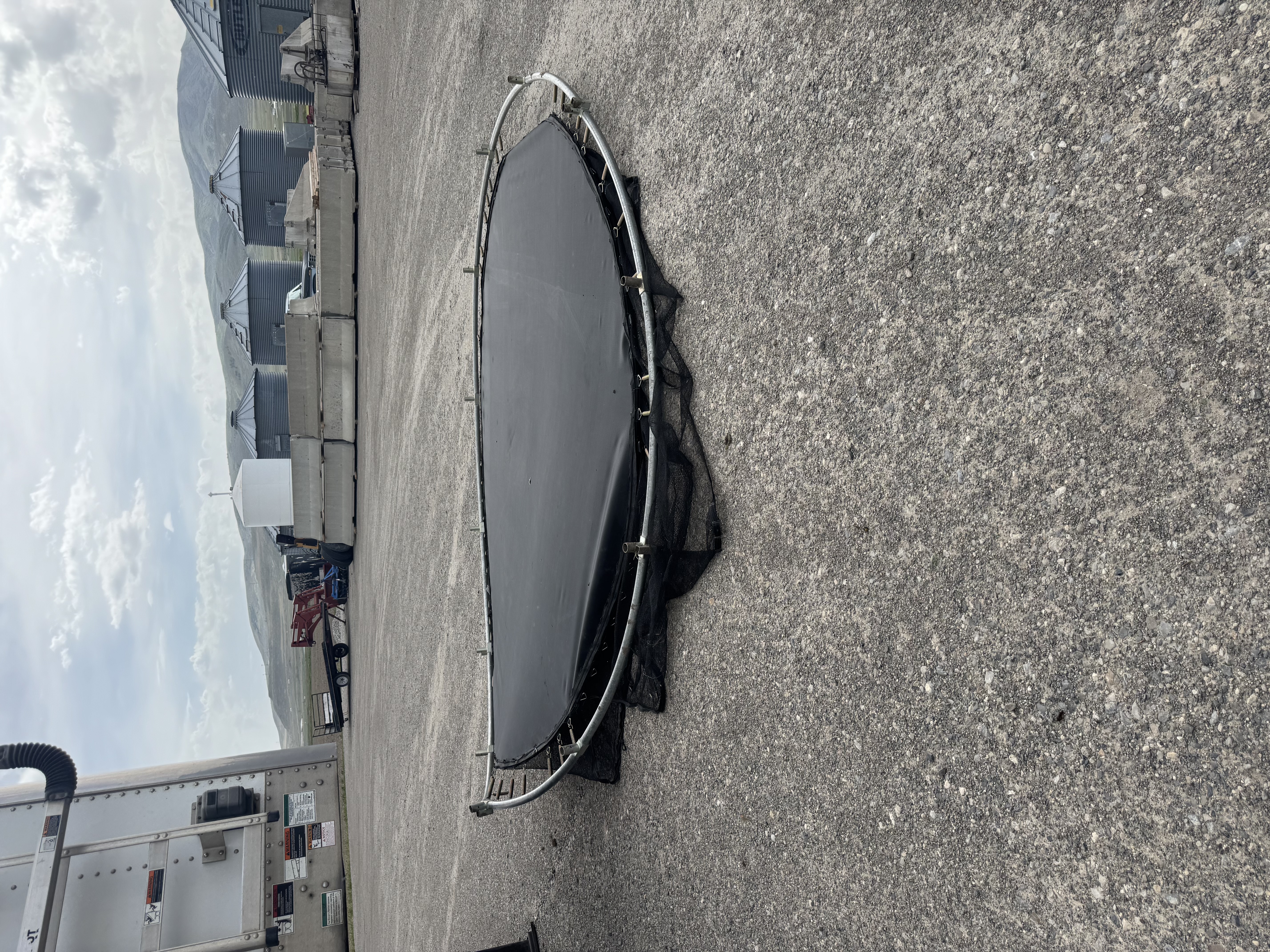 Wind damage shows a trampoline that blew into a neighbors semi trailer in Riverside on Wednesday.