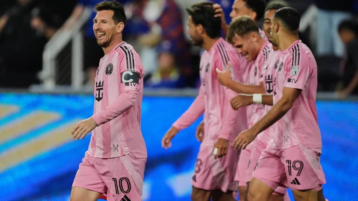 Inter Miami CF midfielder Lionel Messi, left, celebrates after scoring a goal during the second half of an MLS soccer game Wednesday, May 13, 2026, in Cincinnati.