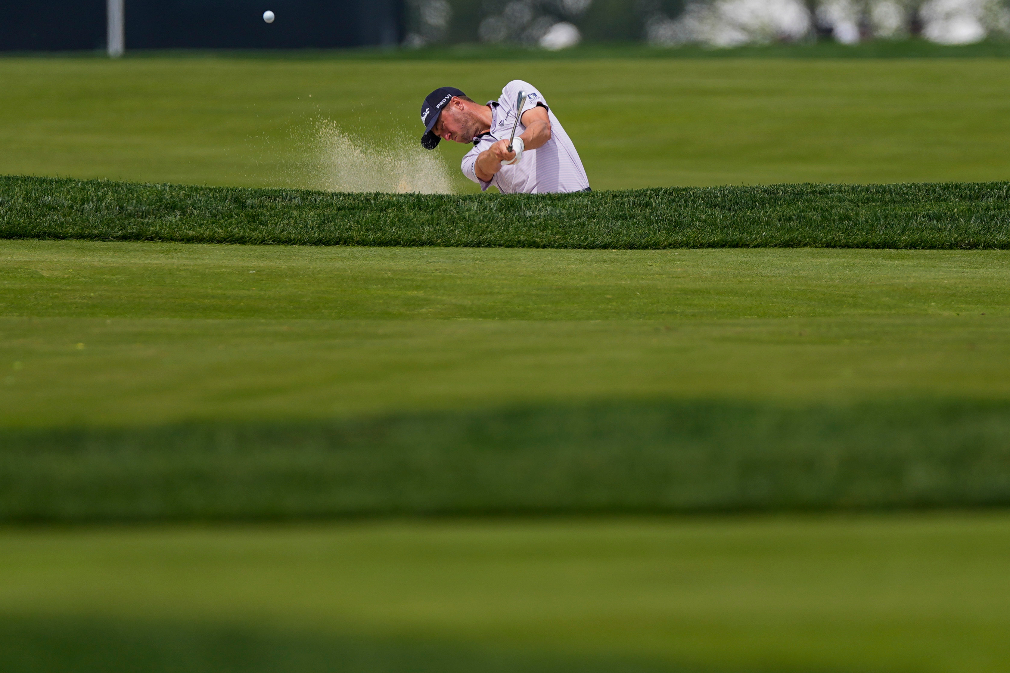 Justin Thomas hits from the third fairway during a PGA Championship golf tournament practice round at Aronimink Golf Club, Wednesday, May 13, 2026, in Newtown Square, PA. 