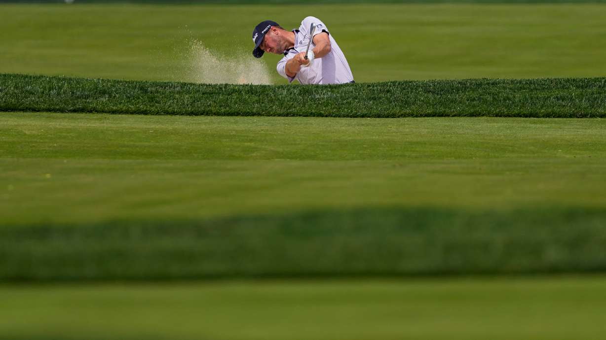 Justin Thomas hits from the third fairway during a PGA Championship golf tournament practice round at Aronimink Golf Club, Wednesday, May 13, 2026, in Newtown Square, PA.