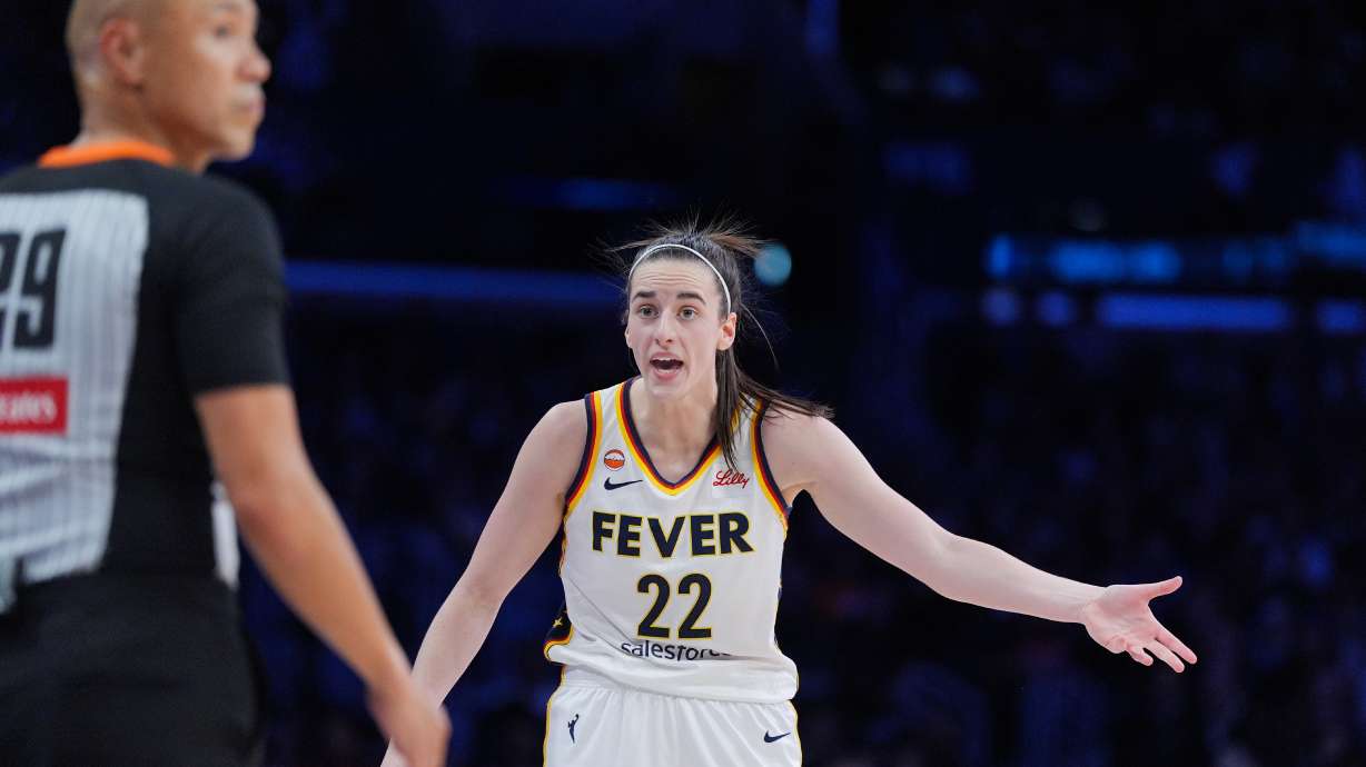 Indiana Fever guard Caitlin Clark (22) reacts to a call during the first half of a WNBA basketball game against the Los Angeles Sparks Wednesday, May 13, 2026, in Los Angeles.