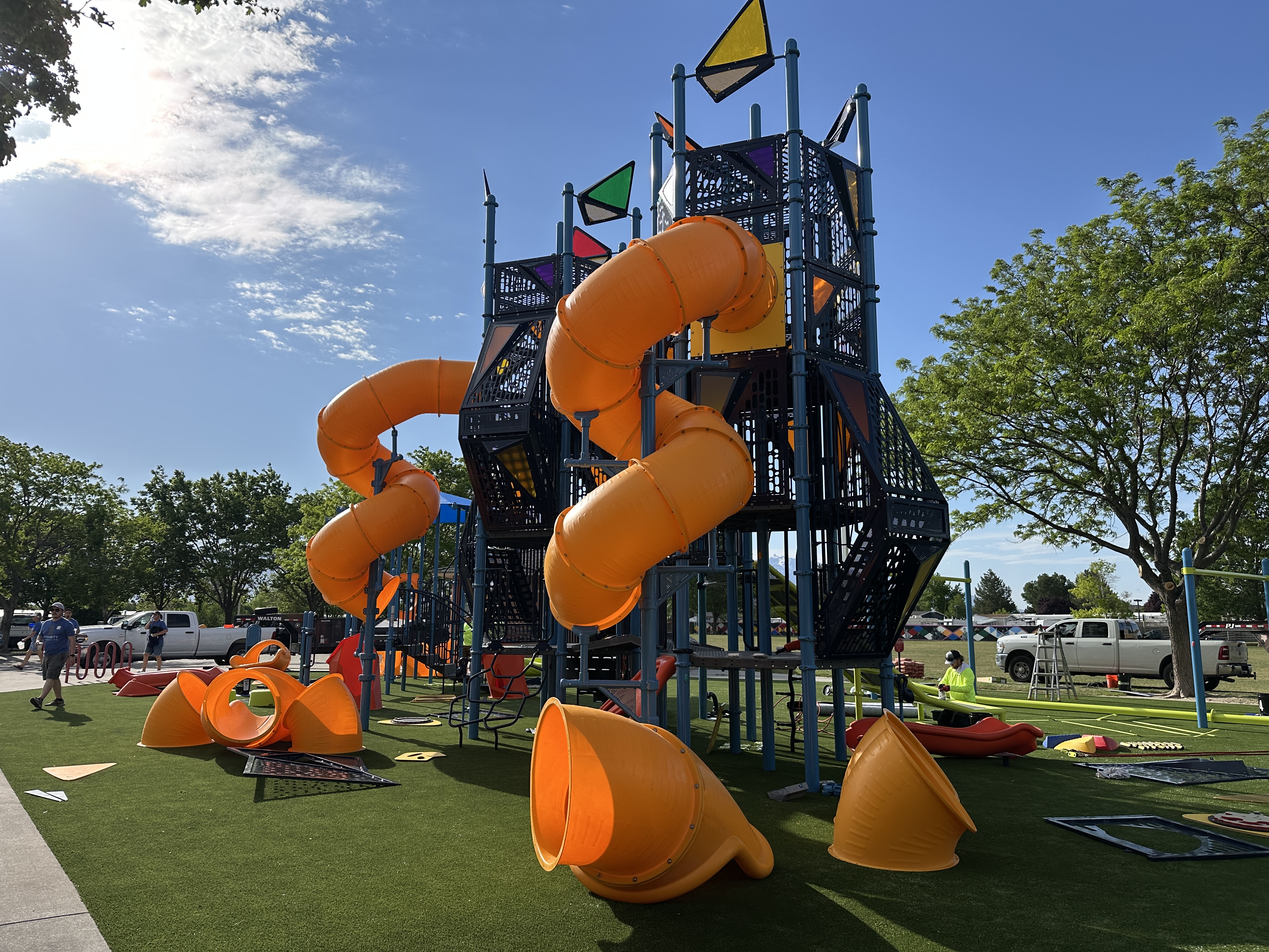 Employees from Integrity and community volunteers unite to revitalize the playground at Parkway Park in West Valley on Wednesday.