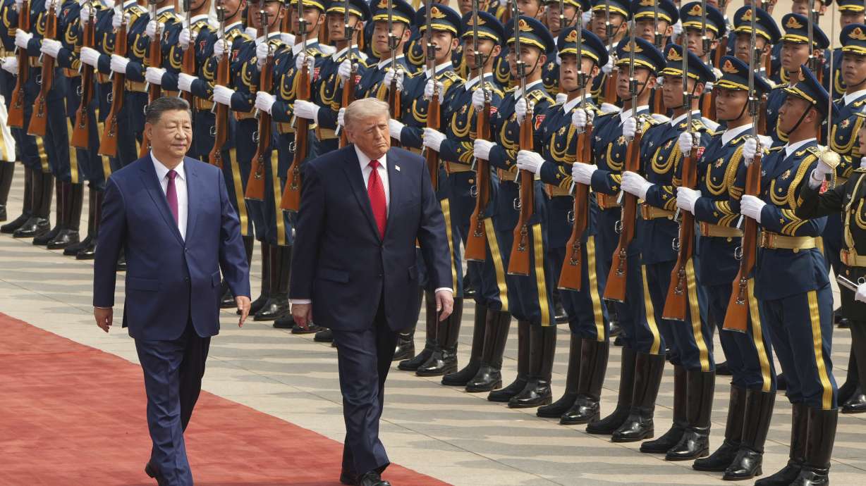 President Donald Trump participates in a welcome ceremony with China's President Xi Jinping at the Great Hall of the People, Thursday in Beijing.