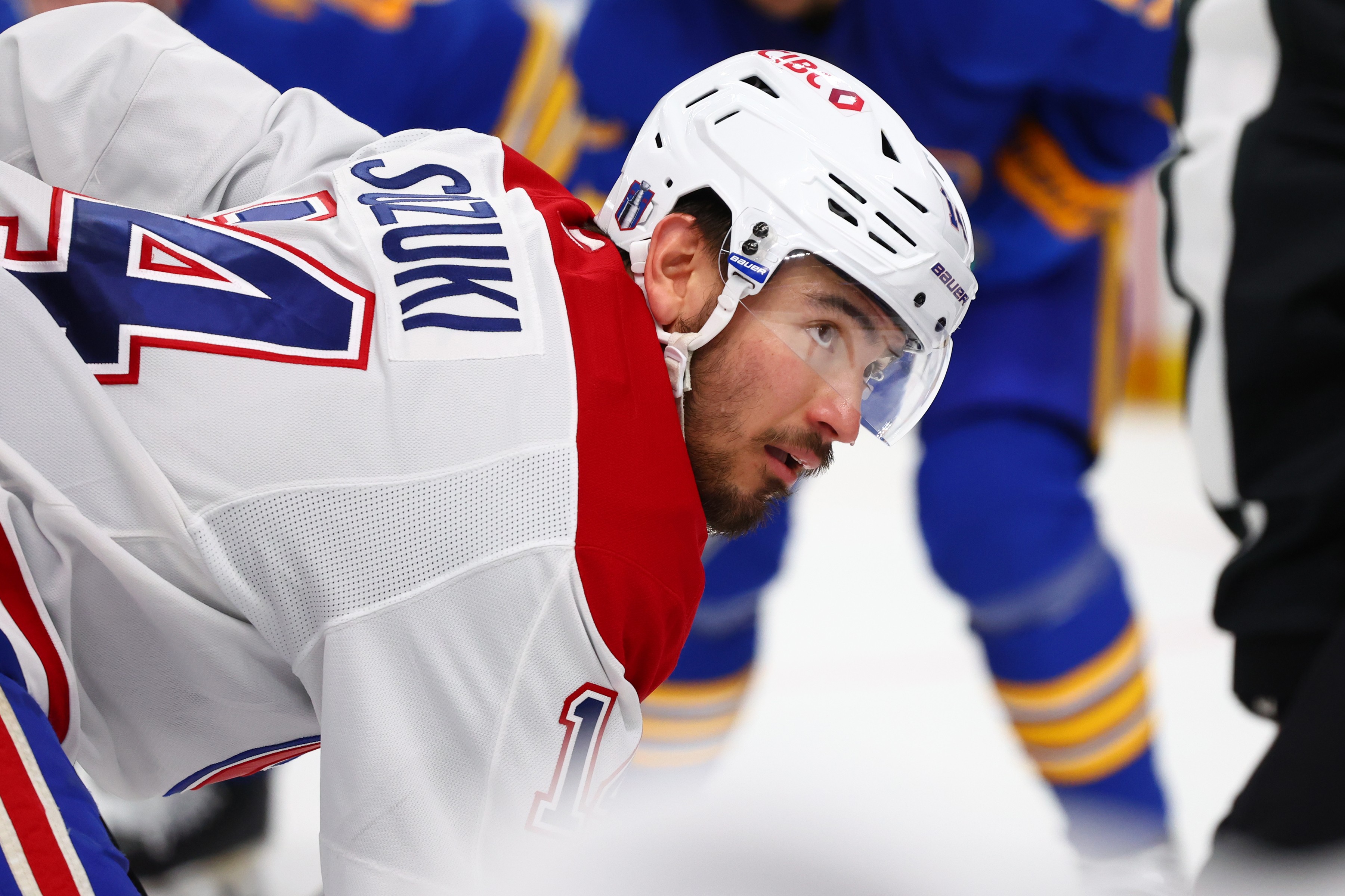 Montreal Canadiens center Nick Suzuki lines up for a face-off during the second period in Game 5 of a second-round NHL hockey Stanley Cup playoff series against the Buffalo Sabres, Thursday, May 14, 2026, in Buffalo, N.Y.